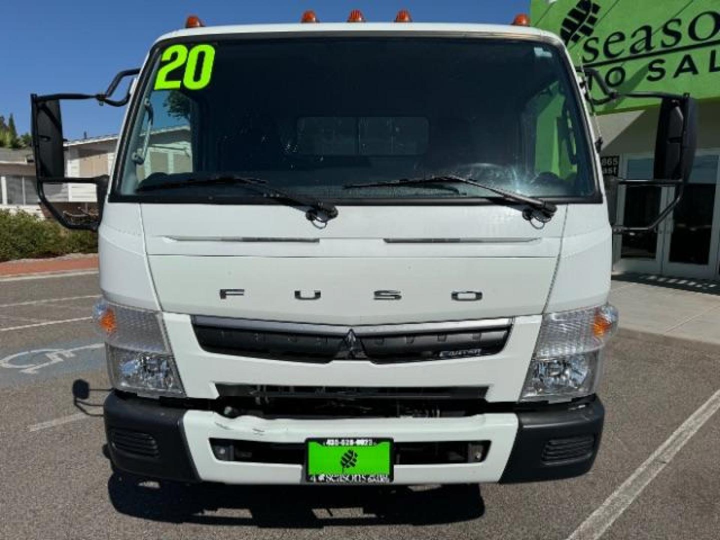 2020 White /Black Mitsubishi Fuso FE180 (4UZCXE119LG) with an 6L engine, Automatic transmission, located at 1865 East Red Hills Pkwy, St. George, 84770, (435) 628-0023, 37.120850, -113.543640 - Fuso FE180 dump truck. 26k miles. Runs a drives great! FE180 Dump Truck is a powerful and versatile commercial vehicle with a GVWR of 17,995 pounds. It is powered by the GMC 6.0L turbocharged V8 gas engine paired with an Allison 6-speed automatic transmission. Standard features include air conditi - Photo#1