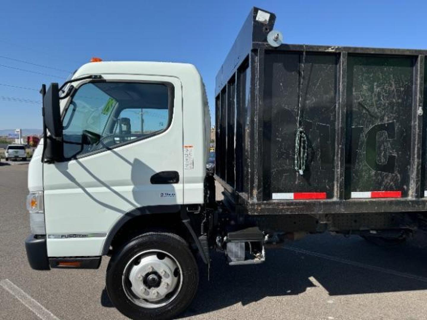 2020 White /Black Mitsubishi Fuso FE180 (4UZCXE119LG) with an 6L engine, Automatic transmission, located at 1865 East Red Hills Pkwy, St. George, 84770, (435) 628-0023, 37.120850, -113.543640 - Fuso FE180 dump truck. 26k miles. Runs a drives great! FE180 Dump Truck is a powerful and versatile commercial vehicle with a GVWR of 17,995 pounds. It is powered by the GMC 6.0L turbocharged V8 gas engine paired with an Allison 6-speed automatic transmission. Standard features include air conditi - Photo#3