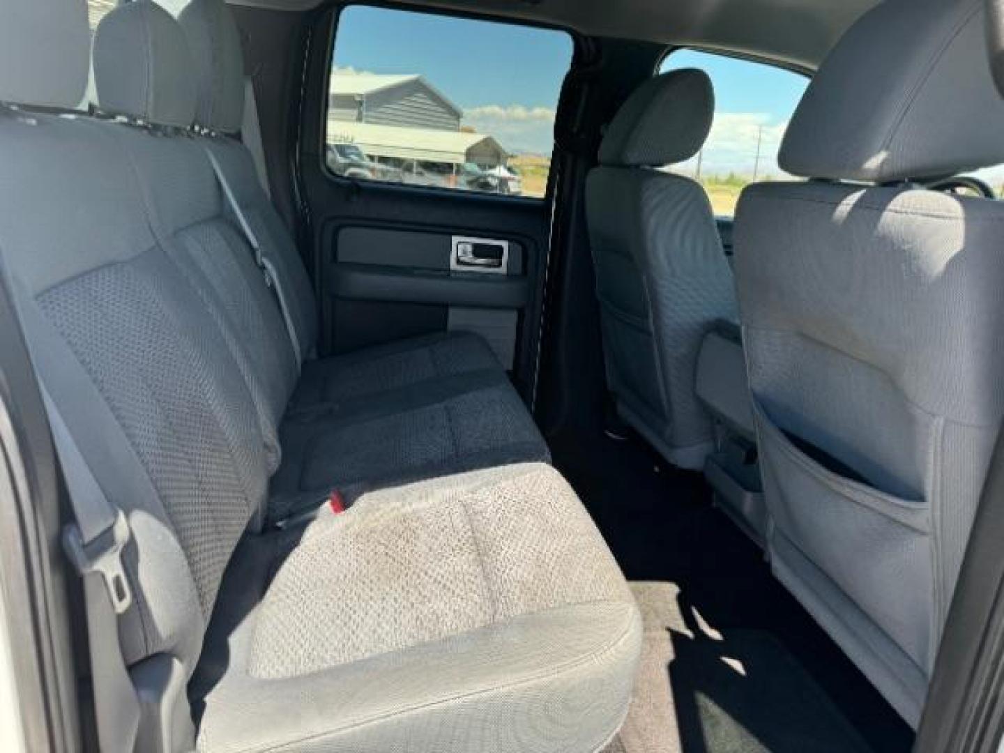 2011 Oxford White /Steel Gray Cloth Interior Ford F-150 XLT SuperCrew 5.5-ft. Bed 2WD (1FTFW1CF0BF) with an 5.0L V8 engine, 6-Speed Automatic transmission, located at 940 North Main Street, Cedar City, UT, 84720, (435) 628-0023, 37.692936, -113.061897 - Photo#30