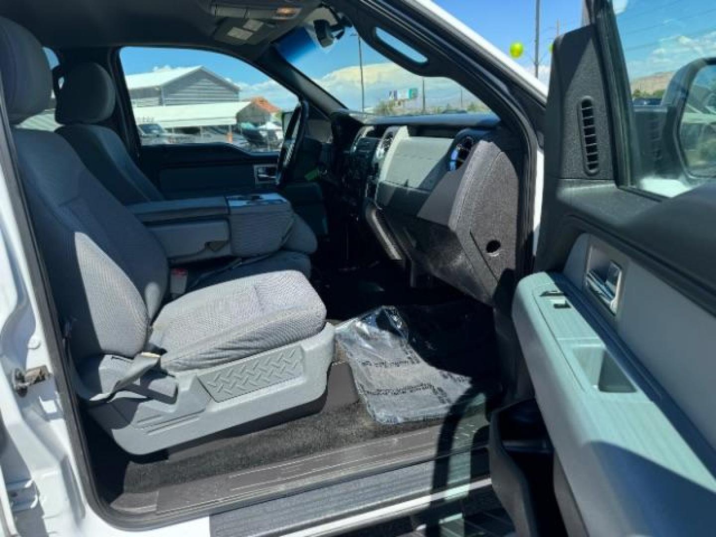 2011 Oxford White /Steel Gray Cloth Interior Ford F-150 XLT SuperCrew 5.5-ft. Bed 2WD (1FTFW1CF0BF) with an 5.0L V8 engine, 6-Speed Automatic transmission, located at 940 North Main Street, Cedar City, UT, 84720, (435) 628-0023, 37.692936, -113.061897 - Photo#31