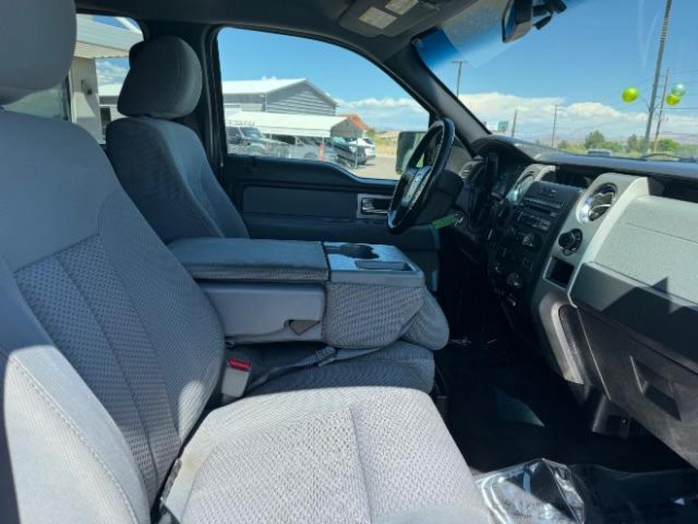 2011 Oxford White /Steel Gray Cloth Interior Ford F-150 XLT SuperCrew 5.5-ft. Bed 2WD (1FTFW1CF0BF) with an 5.0L V8 engine, 6-Speed Automatic transmission, located at 940 North Main Street, Cedar City, UT, 84720, (435) 628-0023, 37.692936, -113.061897 - Photo#34