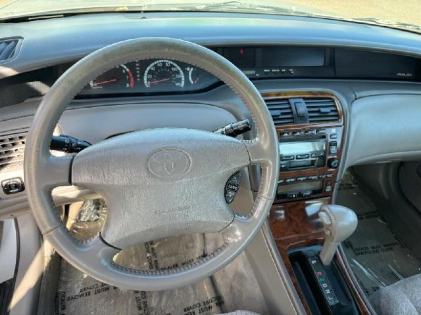 2000 Silver Spruce Metallic /Stone Cloth Toyota Avalon XLS (4T1BF28B2YU) with an 3.0L V6 DOHC 24V engine, 4-Speed Automatic transmission, located at 1865 East Red Hills Pkwy, St. George, 84770, (435) 628-0023, 37.120850, -113.543640 - This vehicle is a Mechanic Special. This means it will need some love. Runs a drives fine but has body damage, leaks or other mechanical issues. It did NOT pass our 50 point inspection. Get a great deal on a less than perfect car. These cars do NOT qualify for our in house financing. Cash and carry, - Photo#9