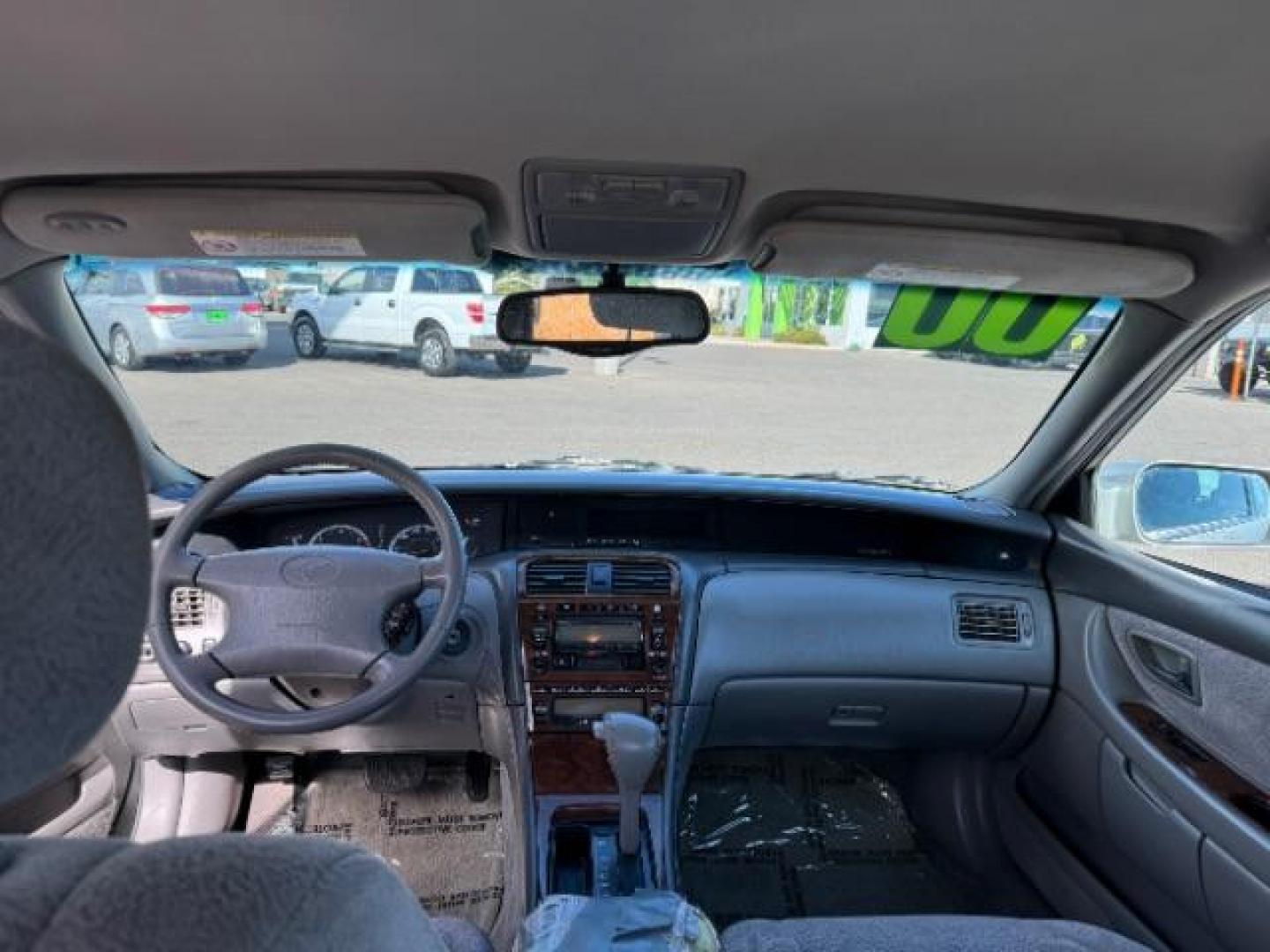 2000 Silver Spruce Metallic /Stone Cloth Toyota Avalon XLS (4T1BF28B2YU) with an 3.0L V6 DOHC 24V engine, 4-Speed Automatic transmission, located at 1865 East Red Hills Pkwy, St. George, 84770, (435) 628-0023, 37.120850, -113.543640 - This vehicle is a Mechanic Special. This means it will need some love. Runs a drives fine but has body damage, leaks or other mechanical issues. It did NOT pass our 50 point inspection. Get a great deal on a less than perfect car. These cars do NOT qualify for our in house financing. Cash and carry, - Photo#10