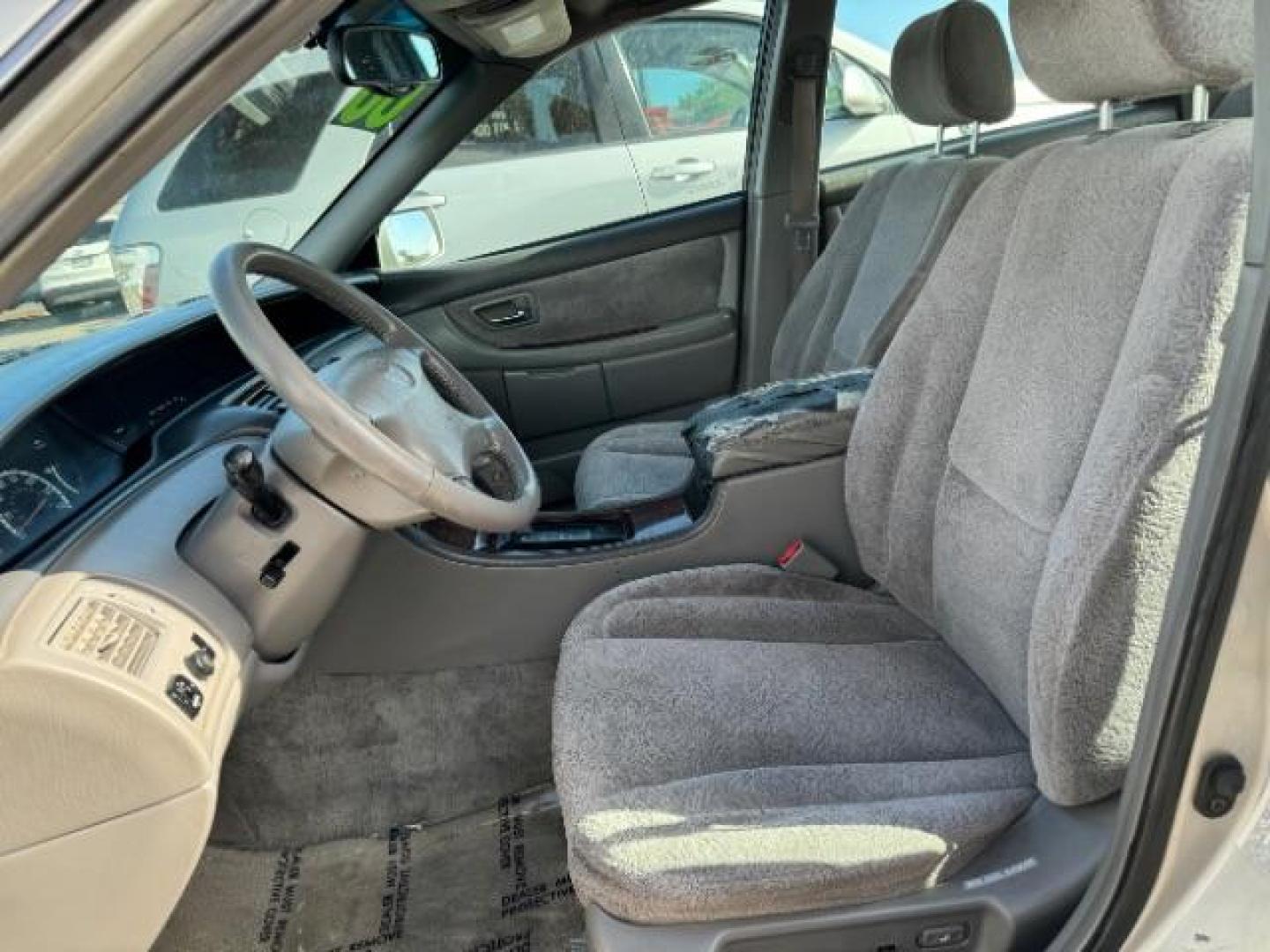 2000 Silver Spruce Metallic /Stone Cloth Toyota Avalon XLS (4T1BF28B2YU) with an 3.0L V6 DOHC 24V engine, 4-Speed Automatic transmission, located at 1865 East Red Hills Pkwy, St. George, 84770, (435) 628-0023, 37.120850, -113.543640 - This vehicle is a Mechanic Special. This means it will need some love. Runs a drives fine but has body damage, leaks or other mechanical issues. It did NOT pass our 50 point inspection. Get a great deal on a less than perfect car. These cars do NOT qualify for our in house financing. Cash and carry, - Photo#8