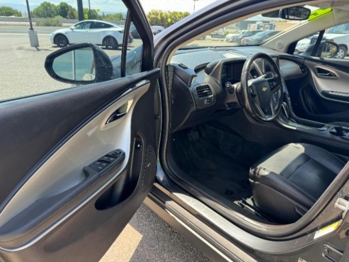 2015 Ashen Gray Metallic /Jet Black/Dark Accents Chevrolet Volt Premium w/ Navigation (1G1RD6E44FU) with an 1.4L L4 DOHC 16V PLUG-IN HYBRID engine, Continuously Variable Transmission transmission, located at 940 North Main Street, Cedar City, UT, 84720, (435) 628-0023, 37.692936, -113.061897 - ***This vehicle qualifies for the EV/Hybrid tax rebate of up to $4,000*** We are setup with the IRS to recieve direct payments within 72 hours. We file the rebate online with IRS and can credit it to your down payment, reduce the sales price OR give you cashback!! These cars will not last and can o - Photo#12