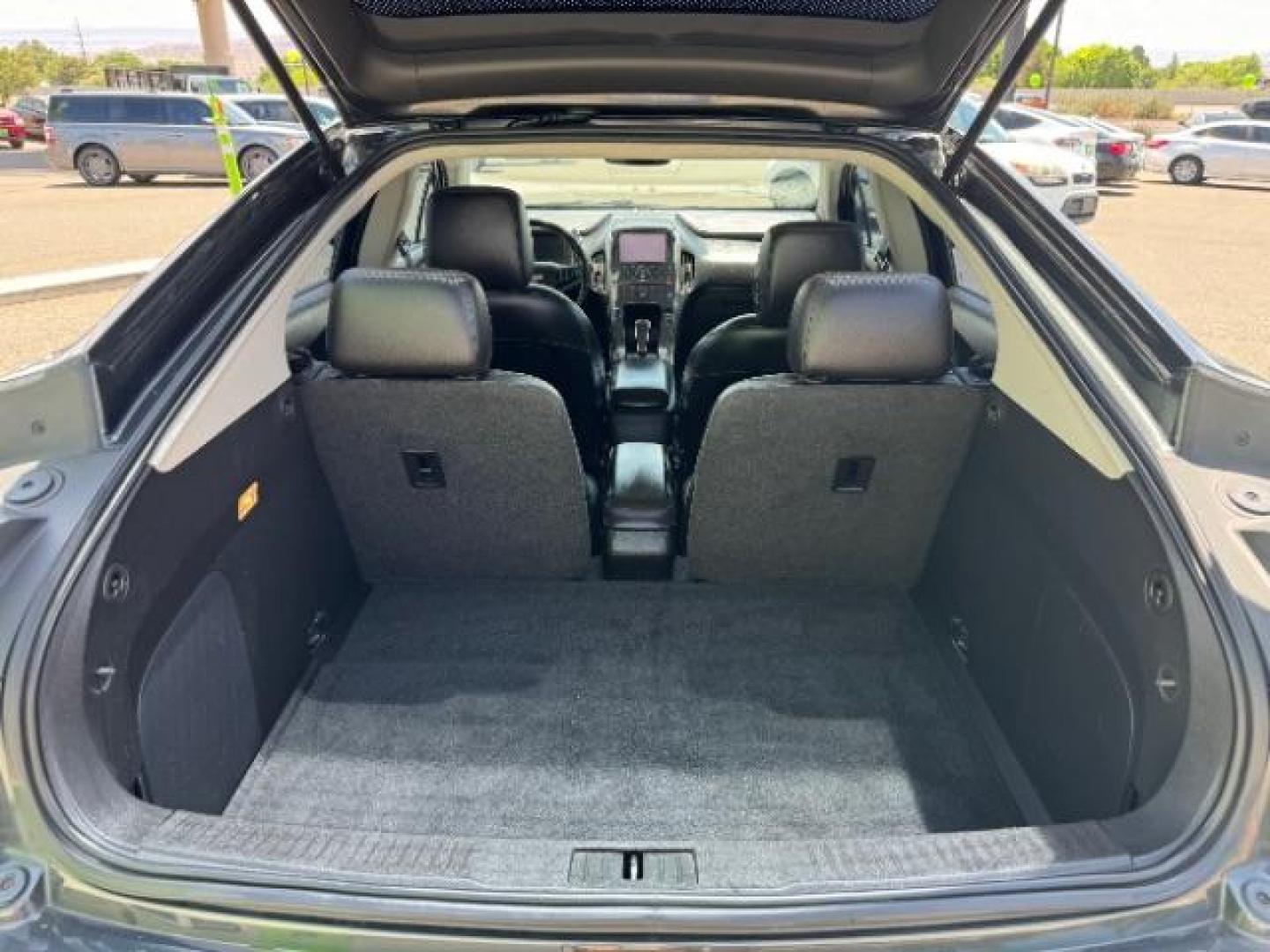 2015 Ashen Gray Metallic /Jet Black/Dark Accents Chevrolet Volt Premium w/ Navigation (1G1RD6E44FU) with an 1.4L L4 DOHC 16V PLUG-IN HYBRID engine, Continuously Variable Transmission transmission, located at 940 North Main Street, Cedar City, UT, 84720, (435) 628-0023, 37.692936, -113.061897 - ***This vehicle qualifies for the EV/Hybrid tax rebate of up to $4,000*** We are setup with the IRS to recieve direct payments within 72 hours. We file the rebate online with IRS and can credit it to your down payment, reduce the sales price OR give you cashback!! These cars will not last and can o - Photo#25