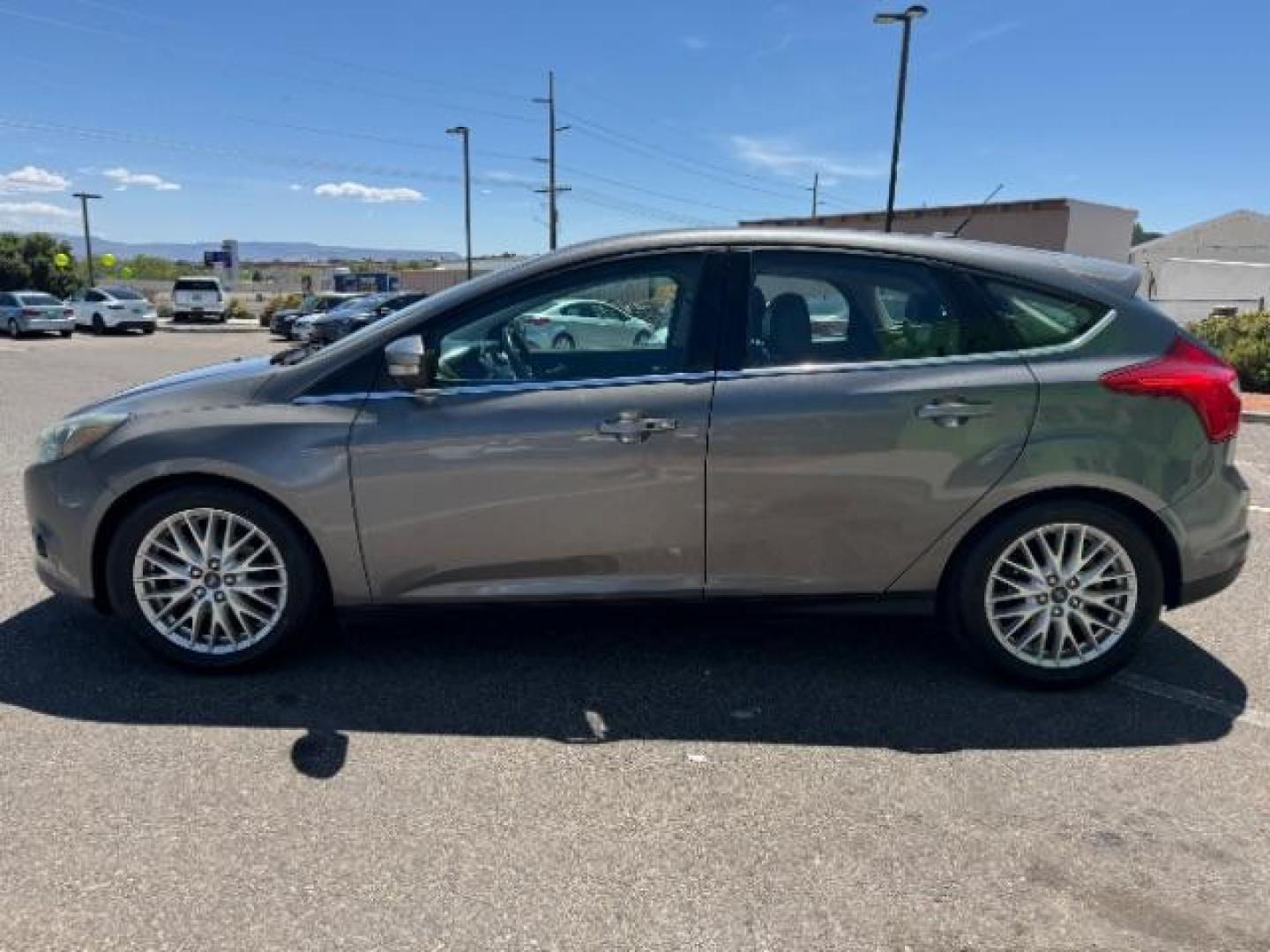 2013 Gray /Charcoal Black Ford Focus Titanium Hatch (1FADP3N23DL) with an 2.0L L4 DOHC 16V engine, 6-Speed Automatic transmission, located at 1865 East Red Hills Pkwy, St. George, 84770, (435) 628-0023, 37.120850, -113.543640 - Photo#3