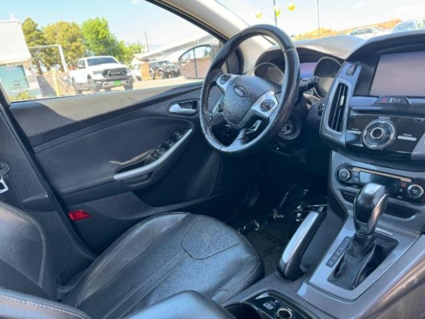 2013 Gray /Charcoal Black Ford Focus Titanium Hatch (1FADP3N23DL) with an 2.0L L4 DOHC 16V engine, 6-Speed Automatic transmission, located at 1865 East Red Hills Pkwy, St. George, 84770, (435) 628-0023, 37.120850, -113.543640 - Photo#27