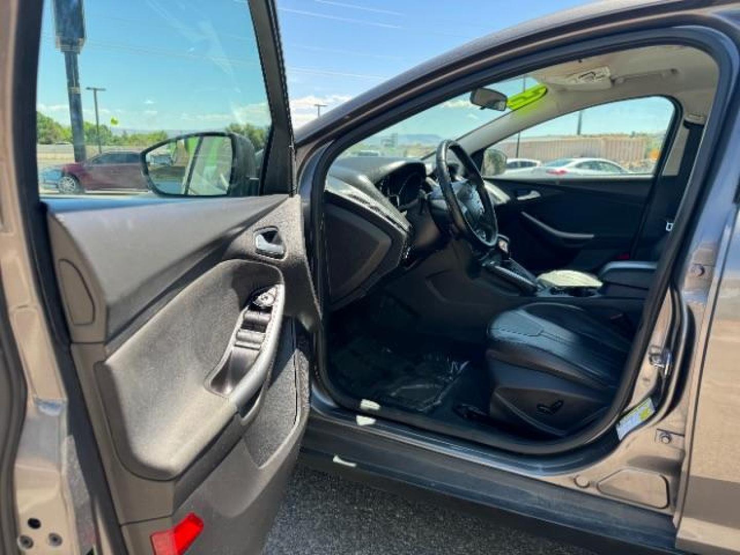 2013 Gray /Charcoal Black Ford Focus Titanium Hatch (1FADP3N23DL) with an 2.0L L4 DOHC 16V engine, 6-Speed Automatic transmission, located at 1865 East Red Hills Pkwy, St. George, 84770, (435) 628-0023, 37.120850, -113.543640 - Photo#12