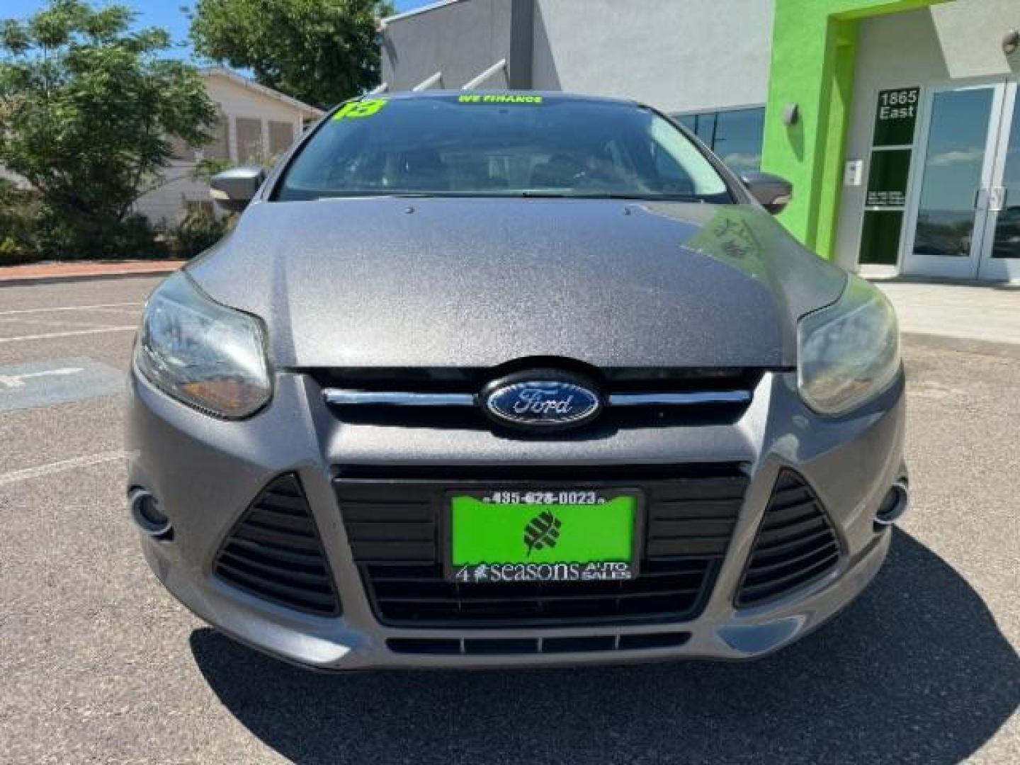 2013 Gray /Charcoal Black Ford Focus Titanium Hatch (1FADP3N23DL) with an 2.0L L4 DOHC 16V engine, 6-Speed Automatic transmission, located at 1865 East Red Hills Pkwy, St. George, 84770, (435) 628-0023, 37.120850, -113.543640 - Photo#1