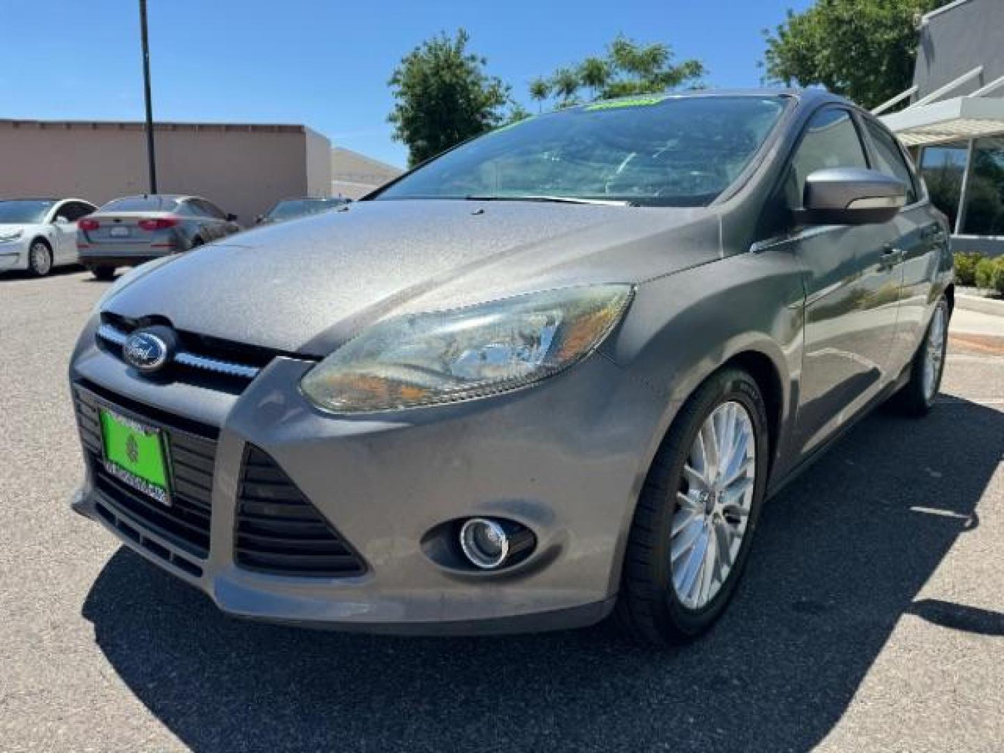 2013 Gray /Charcoal Black Ford Focus Titanium Hatch (1FADP3N23DL) with an 2.0L L4 DOHC 16V engine, 6-Speed Automatic transmission, located at 1865 East Red Hills Pkwy, St. George, 84770, (435) 628-0023, 37.120850, -113.543640 - Photo#2