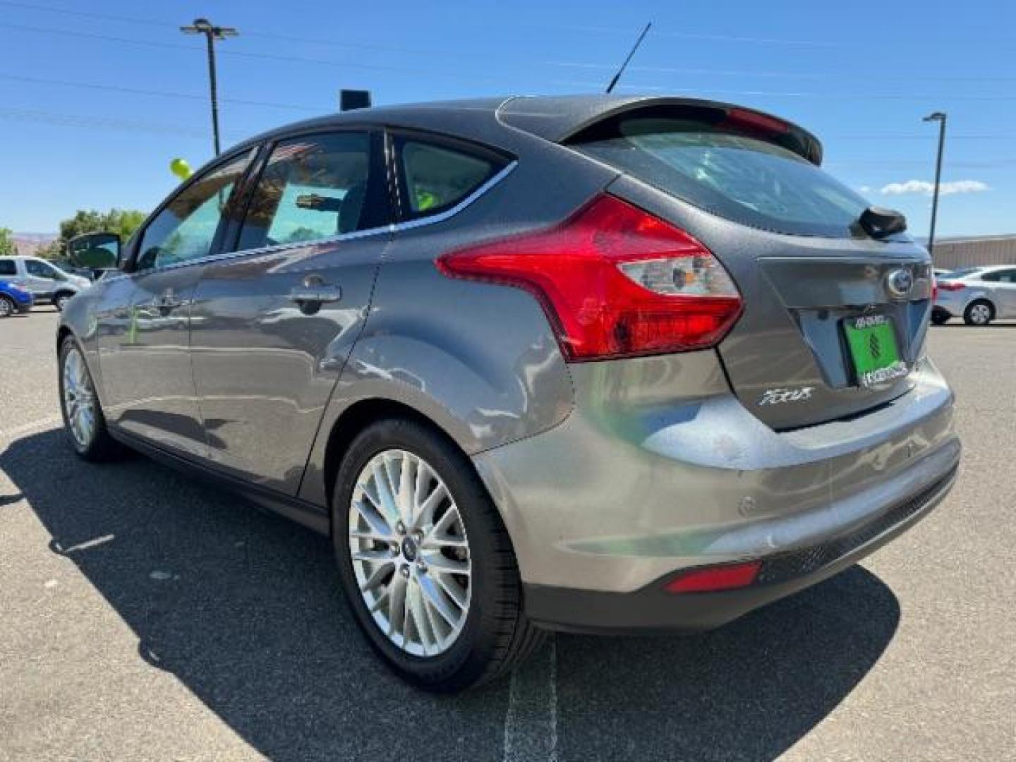 2013 Gray /Charcoal Black Ford Focus Titanium Hatch (1FADP3N23DL) with an 2.0L L4 DOHC 16V engine, 6-Speed Automatic transmission, located at 1865 East Red Hills Pkwy, St. George, 84770, (435) 628-0023, 37.120850, -113.543640 - Photo#4