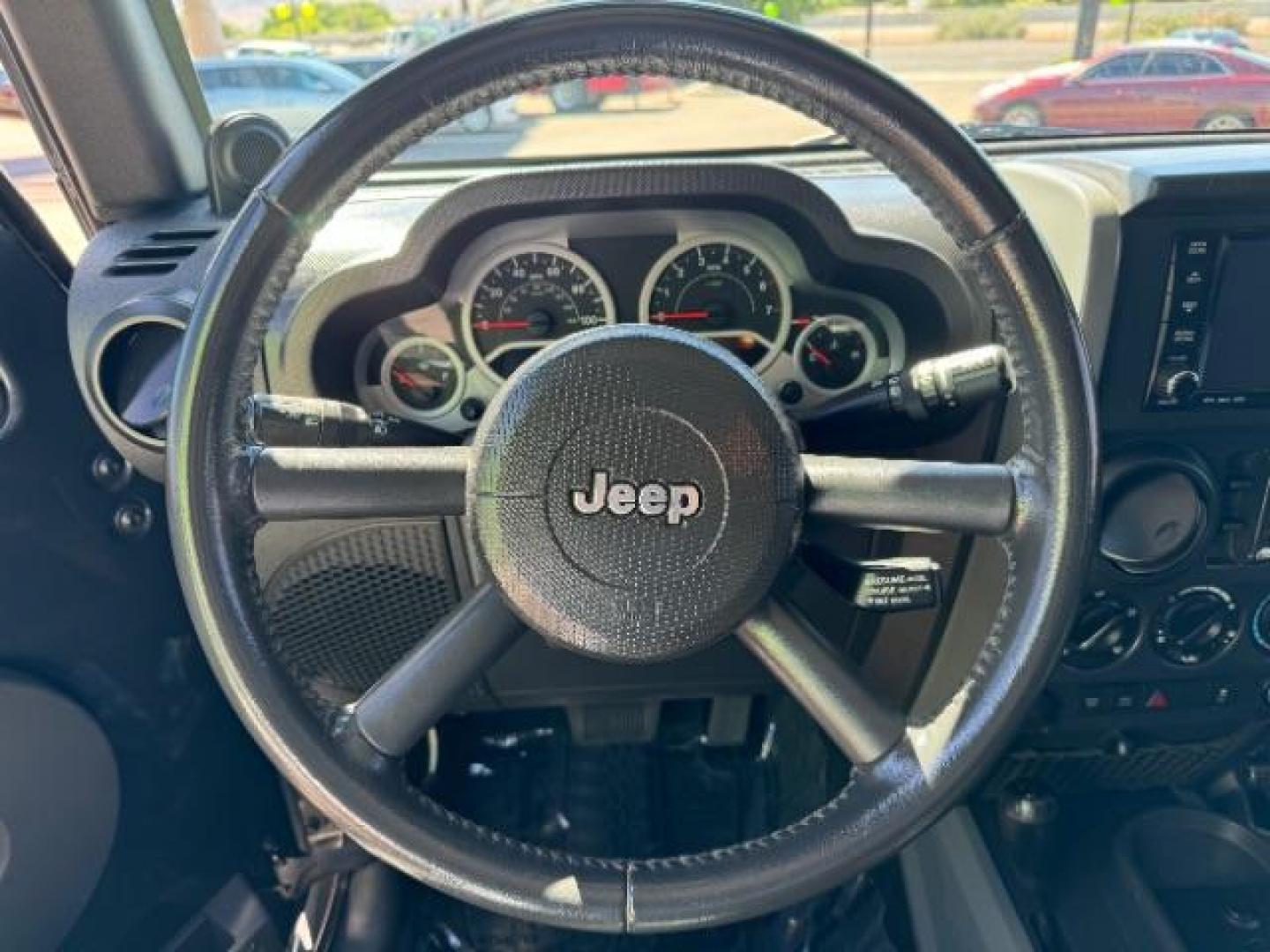 2010 Dark Charcoal Pearl with Black Hard Top /Dark Slate Gray/Medium Slate Gray Cloth Interior Jeep Wrangler Unlimited Rubicon 4WD (1J4BA6H12AL) with an 3.8L V6 OHV 12V engine, 4-Speed Automatic transmission, located at 940 North Main Street, Cedar City, UT, 84720, (435) 628-0023, 37.692936, -113.061897 - We specialize in helping ALL people get the best financing available. No matter your credit score, good, bad or none we can get you an amazing rate. Had a bankruptcy, divorce, or repossessions? We give you the green light to get your credit back on the road. Low down and affordable payments that fit - Photo#15