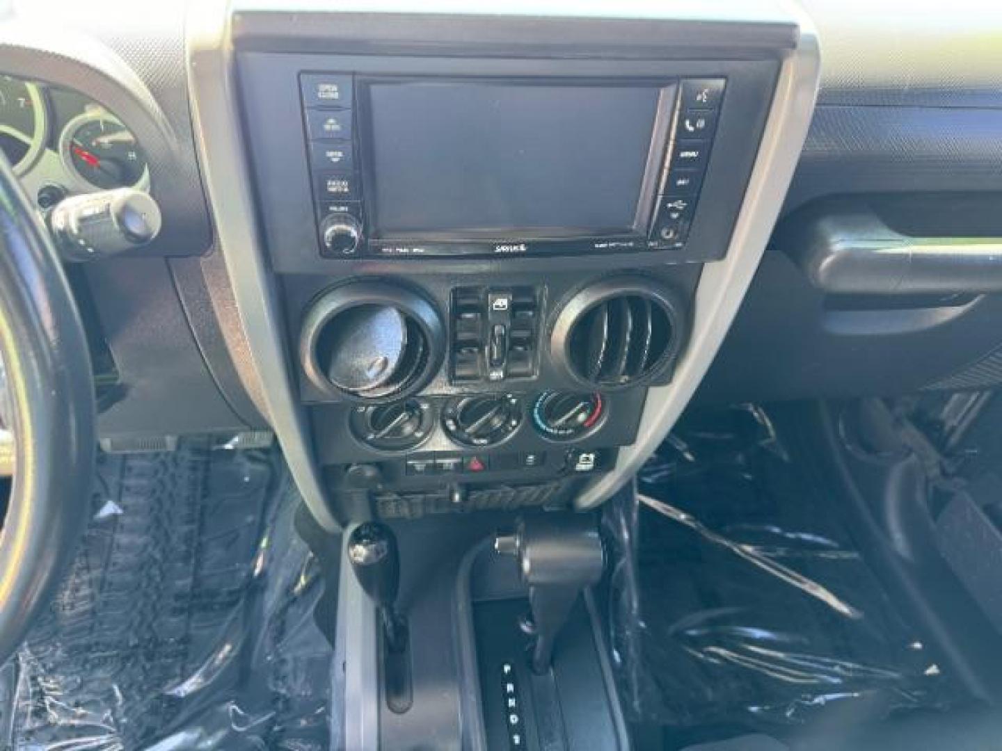 2010 Dark Charcoal Pearl with Black Hard Top /Dark Slate Gray/Medium Slate Gray Cloth Interior Jeep Wrangler Unlimited Rubicon 4WD (1J4BA6H12AL) with an 3.8L V6 OHV 12V engine, 4-Speed Automatic transmission, located at 940 North Main Street, Cedar City, UT, 84720, (435) 628-0023, 37.692936, -113.061897 - We specialize in helping ALL people get the best financing available. No matter your credit score, good, bad or none we can get you an amazing rate. Had a bankruptcy, divorce, or repossessions? We give you the green light to get your credit back on the road. Low down and affordable payments that fit - Photo#16