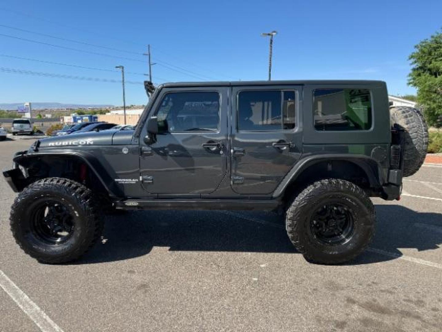 2010 Dark Charcoal Pearl with Black Hard Top /Dark Slate Gray/Medium Slate Gray Cloth Interior Jeep Wrangler Unlimited Rubicon 4WD (1J4BA6H12AL) with an 3.8L V6 OHV 12V engine, 4-Speed Automatic transmission, located at 1865 East Red Hills Pkwy, St. George, 84770, (435) 628-0023, 37.120850, -113.543640 - We specialize in helping ALL people get the best financing available. No matter your credit score, good, bad or none we can get you an amazing rate. Had a bankruptcy, divorce, or repossessions? We give you the green light to get your credit back on the road. Low down and affordable payments that fit - Photo#3