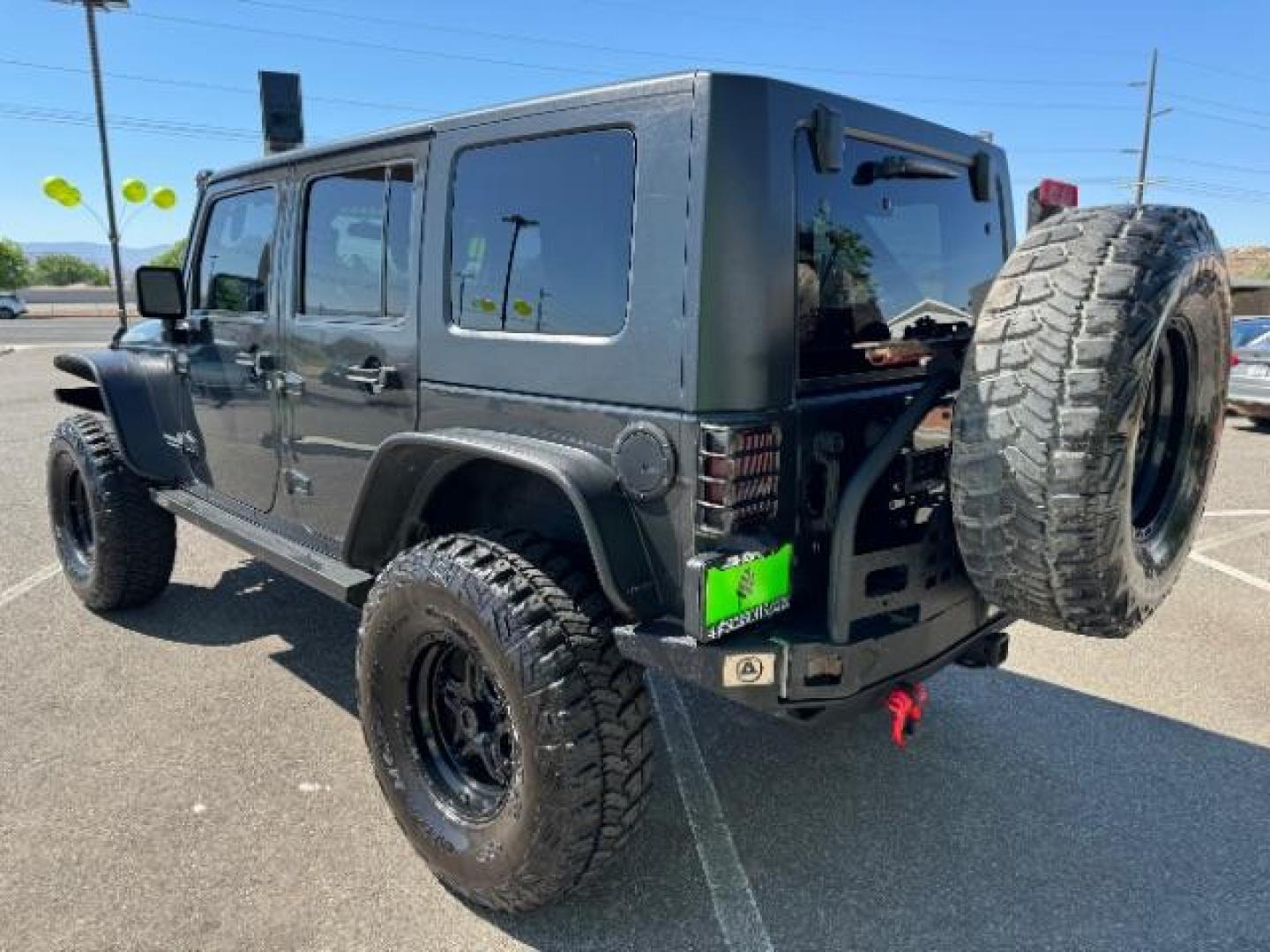 2010 Dark Charcoal Pearl with Black Hard Top /Dark Slate Gray/Medium Slate Gray Cloth Interior Jeep Wrangler Unlimited Rubicon 4WD (1J4BA6H12AL) with an 3.8L V6 OHV 12V engine, 4-Speed Automatic transmission, located at 1865 East Red Hills Pkwy, St. George, 84770, (435) 628-0023, 37.120850, -113.543640 - We specialize in helping ALL people get the best financing available. No matter your credit score, good, bad or none we can get you an amazing rate. Had a bankruptcy, divorce, or repossessions? We give you the green light to get your credit back on the road. Low down and affordable payments that fit - Photo#4