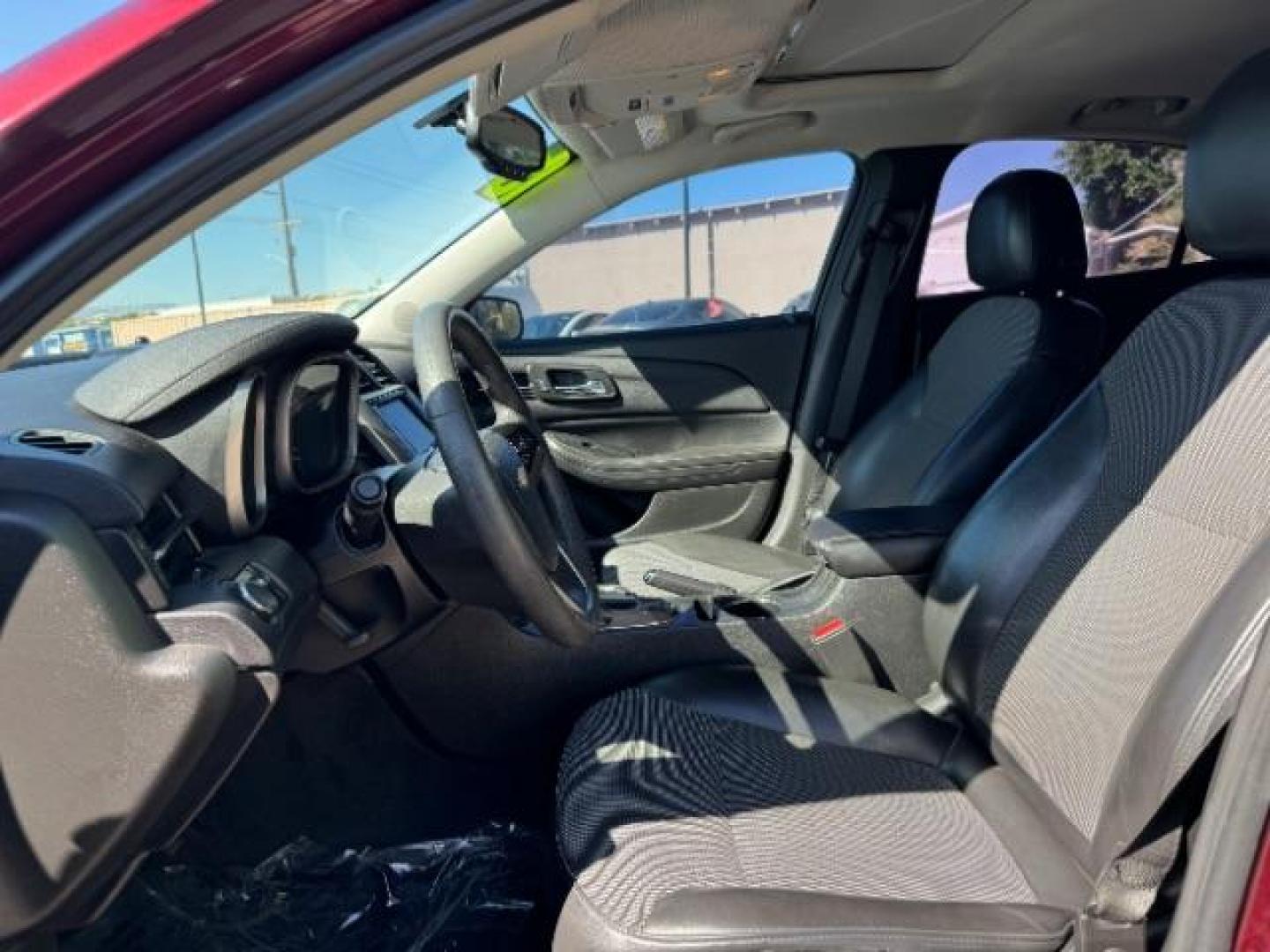 2015 MAROON /Cocoa/Light Neutral Chevrolet Malibu 1LT (1G11C5SL7FF) with an 2.5L L4 DOHC 16V engine, 6-Speed Automatic transmission, located at 1865 East Red Hills Pkwy, St. George, 84770, (435) 628-0023, 37.120850, -113.543640 - Photo#14