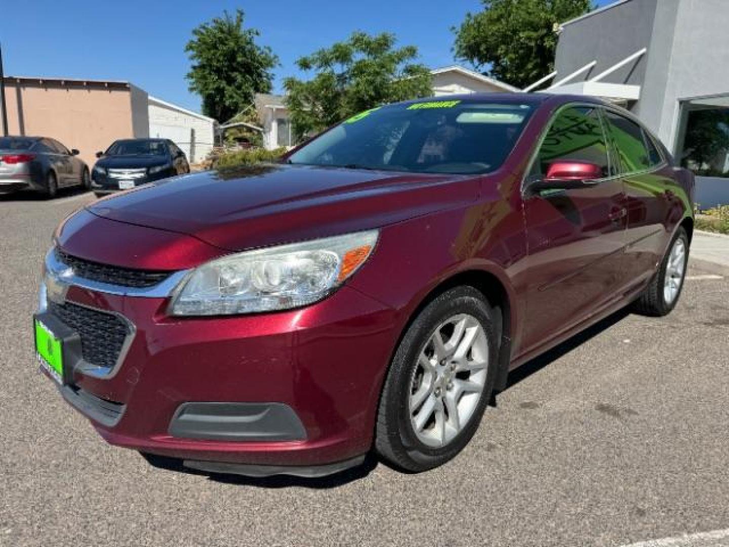 2015 MAROON /Cocoa/Light Neutral Chevrolet Malibu 1LT (1G11C5SL7FF) with an 2.5L L4 DOHC 16V engine, 6-Speed Automatic transmission, located at 1865 East Red Hills Pkwy, St. George, 84770, (435) 628-0023, 37.120850, -113.543640 - Photo#2