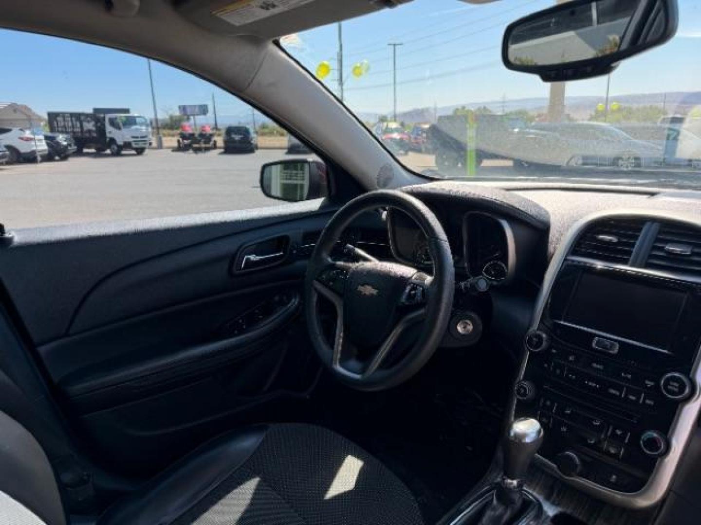 2015 MAROON /Cocoa/Light Neutral Chevrolet Malibu 1LT (1G11C5SL7FF) with an 2.5L L4 DOHC 16V engine, 6-Speed Automatic transmission, located at 1865 East Red Hills Pkwy, St. George, 84770, (435) 628-0023, 37.120850, -113.543640 - Photo#34