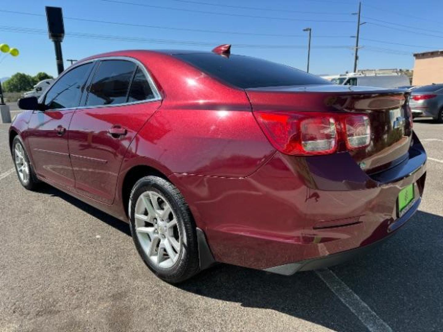 2015 MAROON /Cocoa/Light Neutral Chevrolet Malibu 1LT (1G11C5SL7FF) with an 2.5L L4 DOHC 16V engine, 6-Speed Automatic transmission, located at 1865 East Red Hills Pkwy, St. George, 84770, (435) 628-0023, 37.120850, -113.543640 - Photo#4