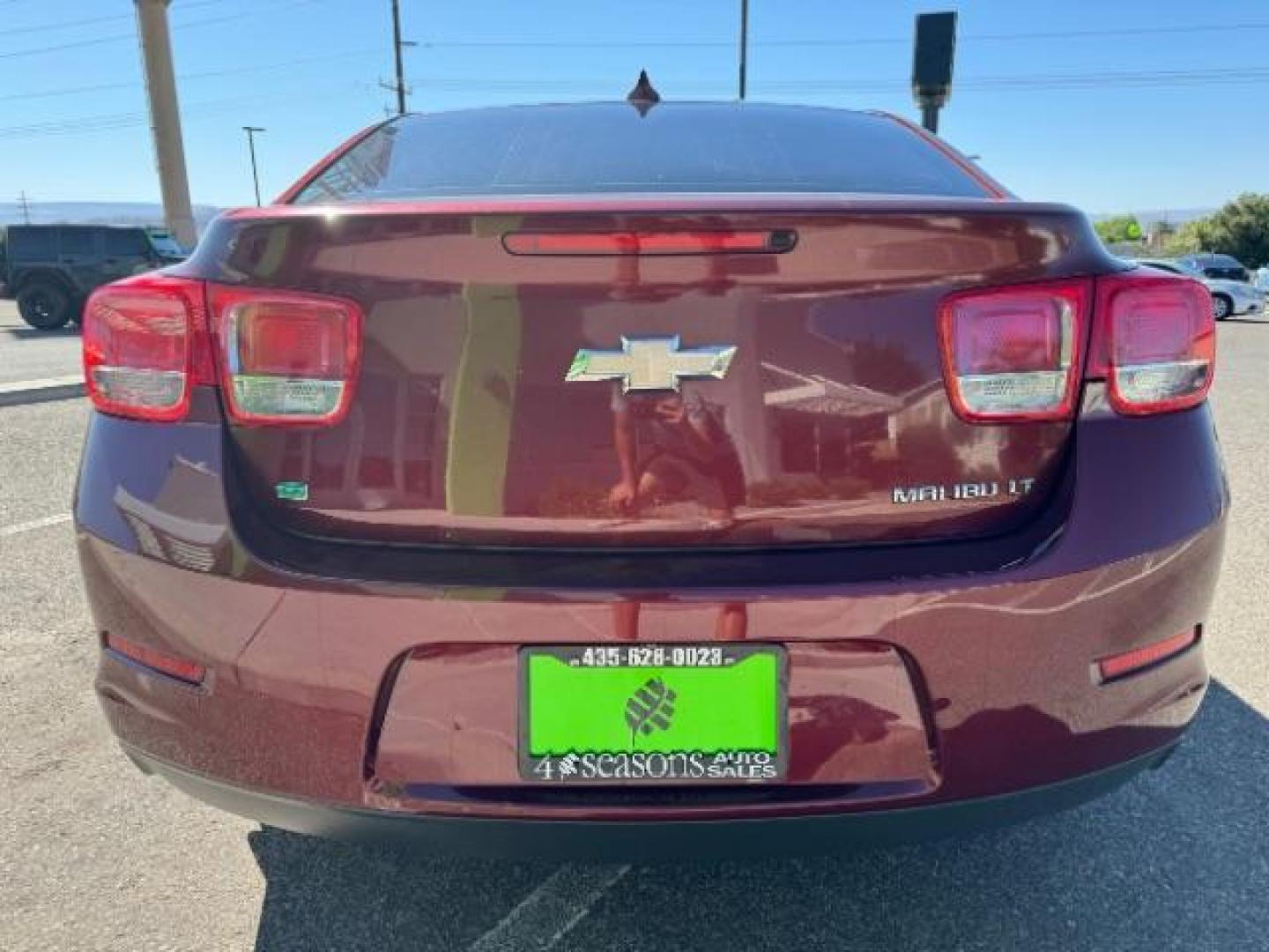 2015 MAROON /Cocoa/Light Neutral Chevrolet Malibu 1LT (1G11C5SL7FF) with an 2.5L L4 DOHC 16V engine, 6-Speed Automatic transmission, located at 1865 East Red Hills Pkwy, St. George, 84770, (435) 628-0023, 37.120850, -113.543640 - Photo#5