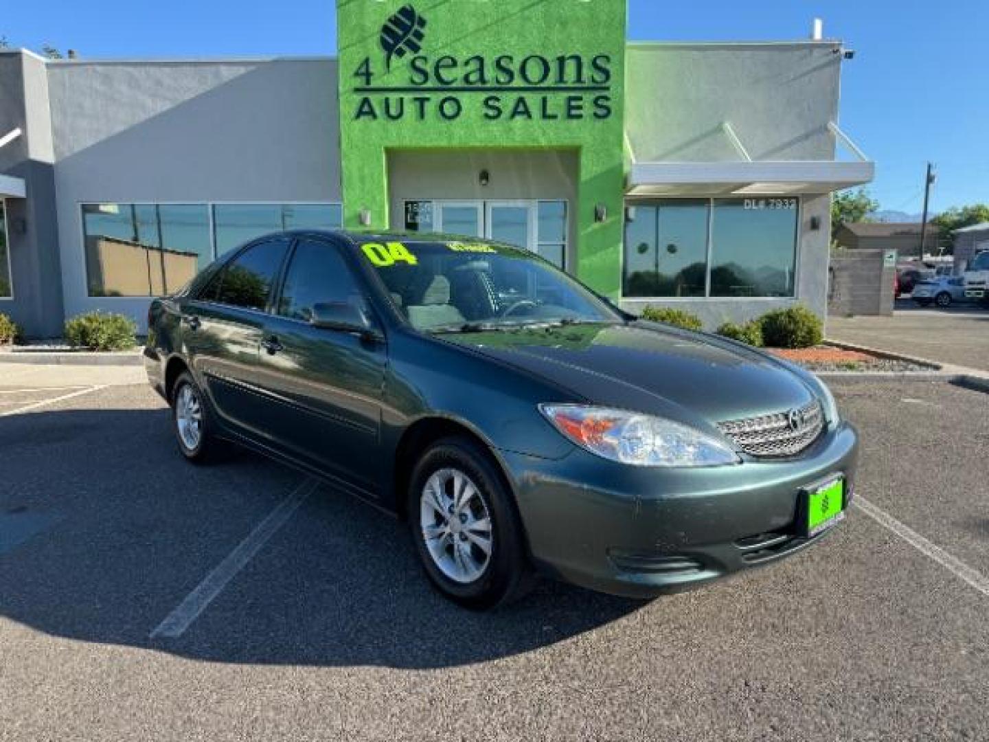 2004 Aspen Green Pearl /Stone Cloth Interior Toyota Camry LE V6 (4T1BF32K64U) with an 3.0L V6 DOHC 24V engine, 5-Speed Automatic transmission, located at 1865 East Red Hills Pkwy, St. George, 84770, (435) 628-0023, 37.120850, -113.543640 - We specialize in helping ALL people get the best financing available. No matter your credit score, good, bad or none we can get you an amazing rate. Had a bankruptcy, divorce, or repossessions? We give you the green light to get your credit back on the road. Low down and affordable payments that fit - Photo#0