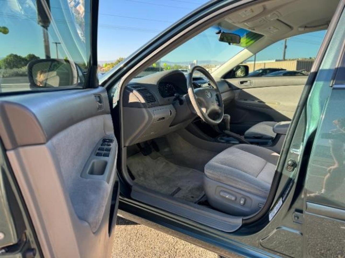 2004 Aspen Green Pearl /Stone Cloth Interior Toyota Camry LE V6 (4T1BF32K64U) with an 3.0L V6 DOHC 24V engine, 5-Speed Automatic transmission, located at 1865 East Red Hills Pkwy, St. George, 84770, (435) 628-0023, 37.120850, -113.543640 - We specialize in helping ALL people get the best financing available. No matter your credit score, good, bad or none we can get you an amazing rate. Had a bankruptcy, divorce, or repossessions? We give you the green light to get your credit back on the road. Low down and affordable payments that fit - Photo#12