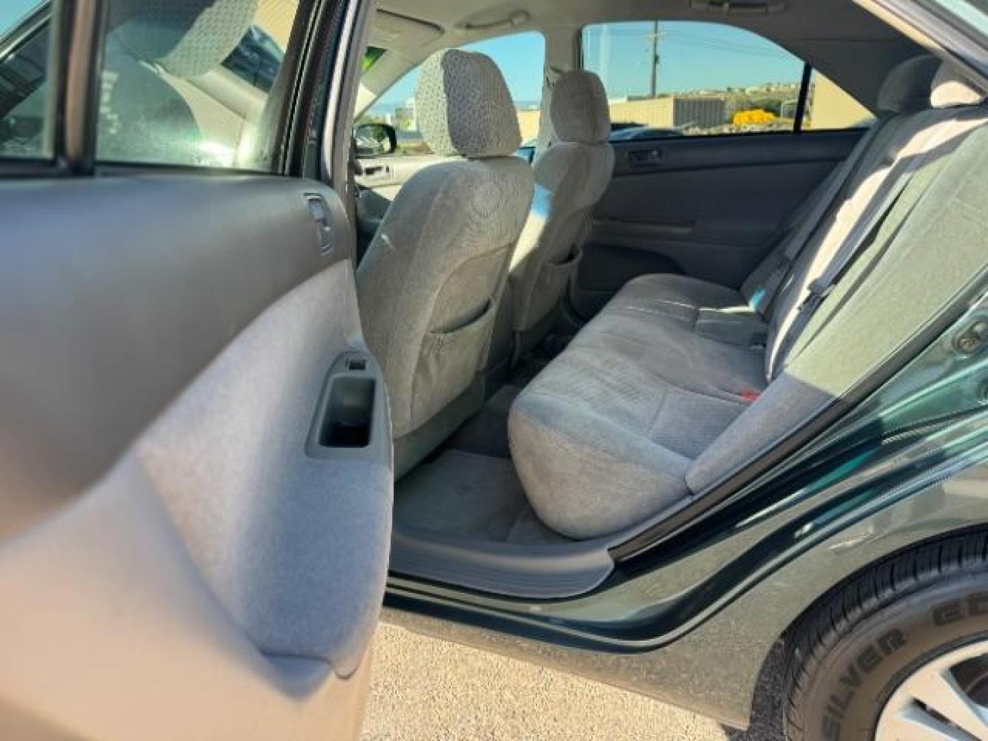 2004 Aspen Green Pearl /Stone Cloth Interior Toyota Camry LE V6 (4T1BF32K64U) with an 3.0L V6 DOHC 24V engine, 5-Speed Automatic transmission, located at 1865 East Red Hills Pkwy, St. George, 84770, (435) 628-0023, 37.120850, -113.543640 - We specialize in helping ALL people get the best financing available. No matter your credit score, good, bad or none we can get you an amazing rate. Had a bankruptcy, divorce, or repossessions? We give you the green light to get your credit back on the road. Low down and affordable payments that fit - Photo#20