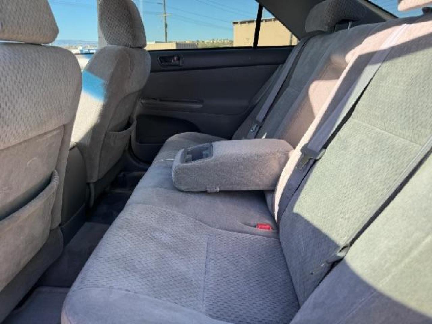 2004 Aspen Green Pearl /Stone Cloth Interior Toyota Camry LE V6 (4T1BF32K64U) with an 3.0L V6 DOHC 24V engine, 5-Speed Automatic transmission, located at 1865 East Red Hills Pkwy, St. George, 84770, (435) 628-0023, 37.120850, -113.543640 - We specialize in helping ALL people get the best financing available. No matter your credit score, good, bad or none we can get you an amazing rate. Had a bankruptcy, divorce, or repossessions? We give you the green light to get your credit back on the road. Low down and affordable payments that fit - Photo#21