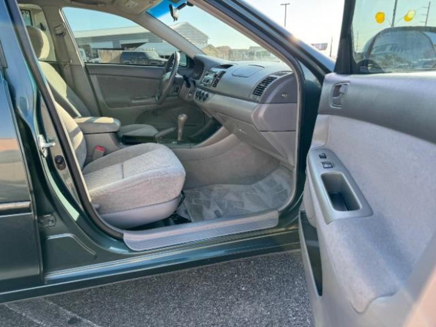 2004 Aspen Green Pearl /Stone Cloth Interior Toyota Camry LE V6 (4T1BF32K64U) with an 3.0L V6 DOHC 24V engine, 5-Speed Automatic transmission, located at 1865 East Red Hills Pkwy, St. George, 84770, (435) 628-0023, 37.120850, -113.543640 - We specialize in helping ALL people get the best financing available. No matter your credit score, good, bad or none we can get you an amazing rate. Had a bankruptcy, divorce, or repossessions? We give you the green light to get your credit back on the road. Low down and affordable payments that fit - Photo#27