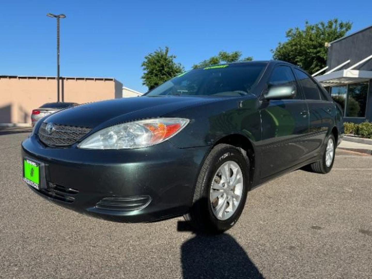 2004 Aspen Green Pearl /Stone Cloth Interior Toyota Camry LE V6 (4T1BF32K64U) with an 3.0L V6 DOHC 24V engine, 5-Speed Automatic transmission, located at 1865 East Red Hills Pkwy, St. George, 84770, (435) 628-0023, 37.120850, -113.543640 - We specialize in helping ALL people get the best financing available. No matter your credit score, good, bad or none we can get you an amazing rate. Had a bankruptcy, divorce, or repossessions? We give you the green light to get your credit back on the road. Low down and affordable payments that fit - Photo#2