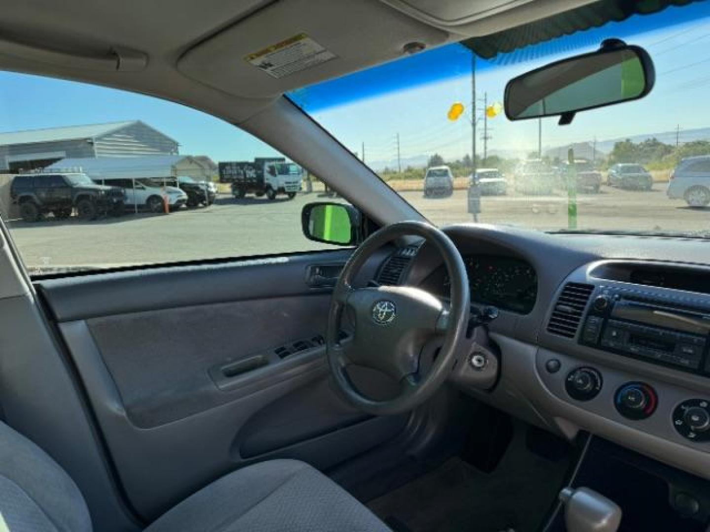 2004 Aspen Green Pearl /Stone Cloth Interior Toyota Camry LE V6 (4T1BF32K64U) with an 3.0L V6 DOHC 24V engine, 5-Speed Automatic transmission, located at 1865 East Red Hills Pkwy, St. George, 84770, (435) 628-0023, 37.120850, -113.543640 - We specialize in helping ALL people get the best financing available. No matter your credit score, good, bad or none we can get you an amazing rate. Had a bankruptcy, divorce, or repossessions? We give you the green light to get your credit back on the road. Low down and affordable payments that fit - Photo#29