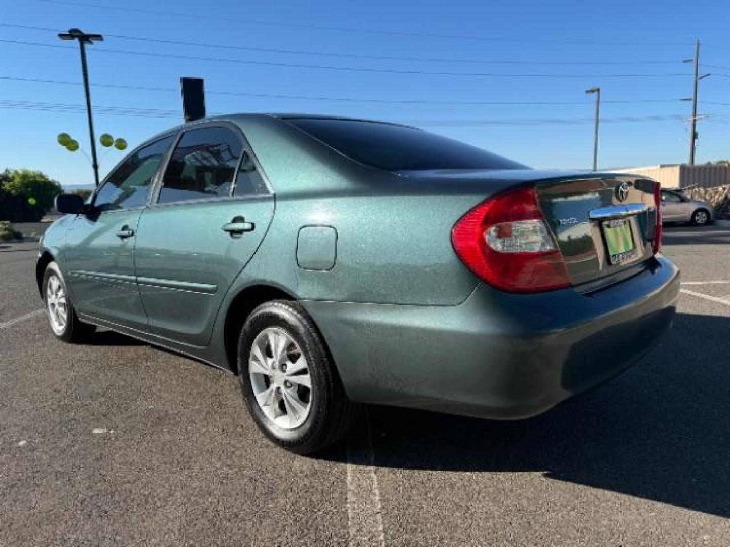 2004 Aspen Green Pearl /Stone Cloth Interior Toyota Camry LE V6 (4T1BF32K64U) with an 3.0L V6 DOHC 24V engine, 5-Speed Automatic transmission, located at 1865 East Red Hills Pkwy, St. George, 84770, (435) 628-0023, 37.120850, -113.543640 - We specialize in helping ALL people get the best financing available. No matter your credit score, good, bad or none we can get you an amazing rate. Had a bankruptcy, divorce, or repossessions? We give you the green light to get your credit back on the road. Low down and affordable payments that fit - Photo#4