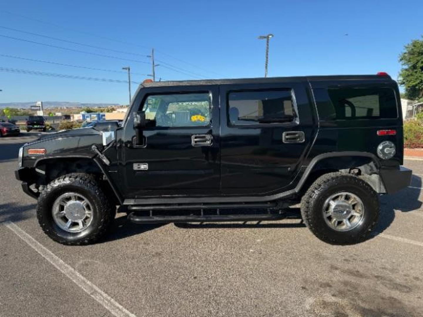 2005 Black /Ebony Leather Interior Hummer H2 SUV (5GRGN23U25H) with an 6.0L V8 OHV 16V engine, 4-Speed Automatic transmission, located at 940 North Main Street, Cedar City, UT, 84720, (435) 628-0023, 37.692936, -113.061897 - We specialize in helping ALL people get the best financing available. No matter your credit score, good, bad or none we can get you an amazing rate. Had a bankruptcy, divorce, or repossessions? We give you the green light to get your credit back on the road. Low down and affordable payments that fit - Photo#3