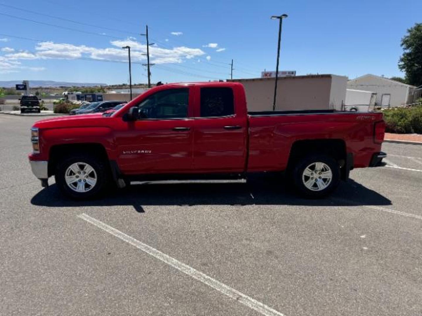 2014 Victory Red /Jet Black Chevrolet Silverado 1500 1LT Double Cab 4WD (1GCVKREC8EZ) with an 5.3L V8 OHV 16V engine, 6-Speed Automatic transmission, located at 1865 East Red Hills Pkwy, St. George, 84770, (435) 628-0023, 37.120850, -113.543640 - Photo#5