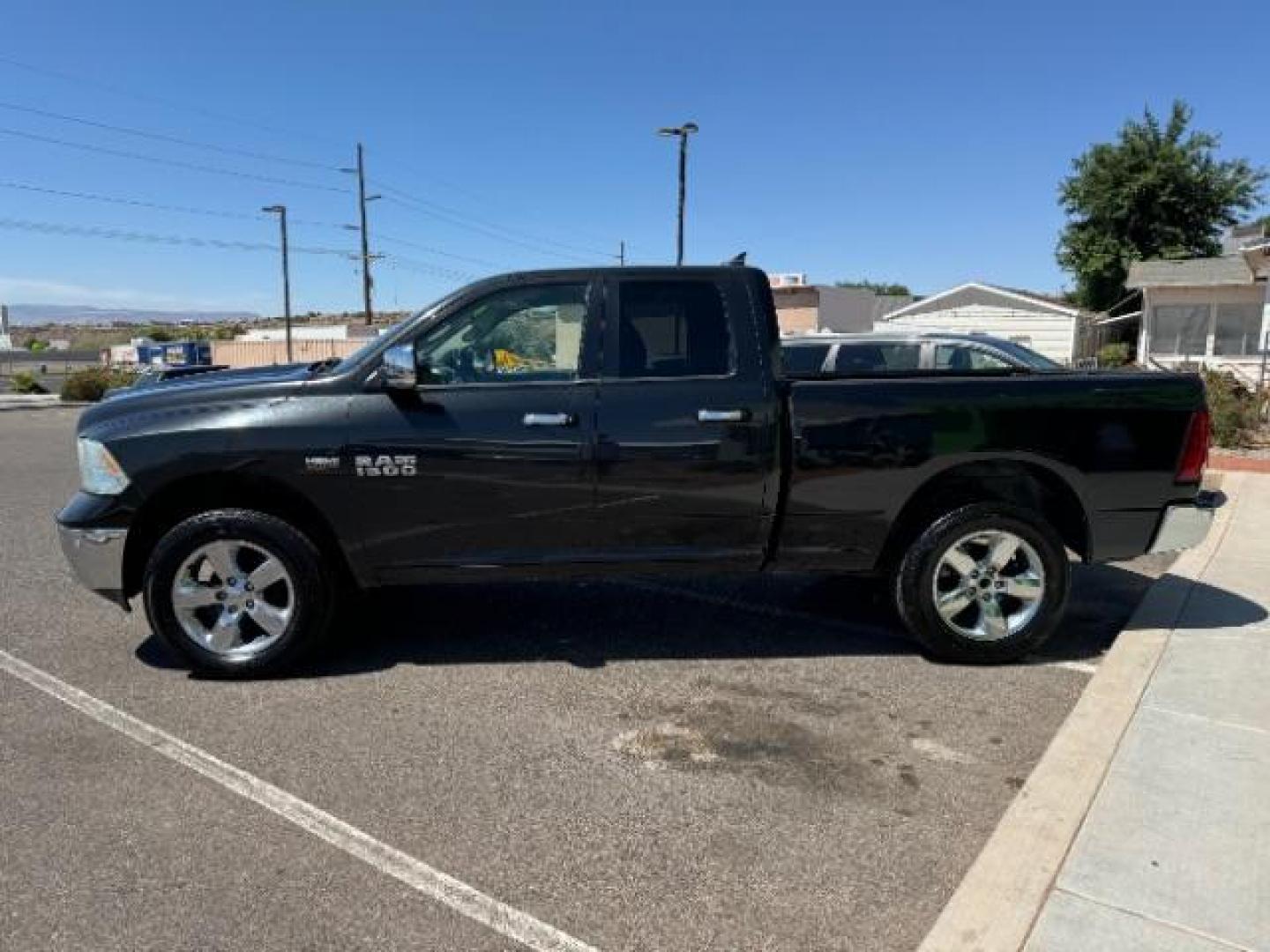 2016 Black Clear Coat RAM 1500 SLT Quad Cab 4WD (1C6RR7GT9GS) with an 5.7L V8 OHV 16V engine, 8-Speed Automatic transmission, located at 1865 East Red Hills Pkwy, St. George, 84770, (435) 628-0023, 37.120850, -113.543640 - Photo#3