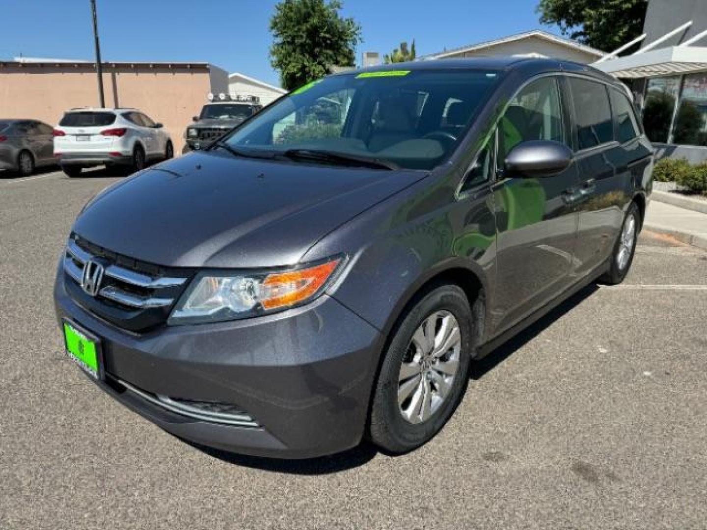 2016 Modern Steel Metallic /Gray, leather Honda Odyssey EX-L (5FNRL5H6XGB) with an 3.5L V6 SOHC 24V engine, 6-Speed Automatic transmission, located at 1865 East Red Hills Pkwy, St. George, 84770, (435) 628-0023, 37.120850, -113.543640 - Photo#2