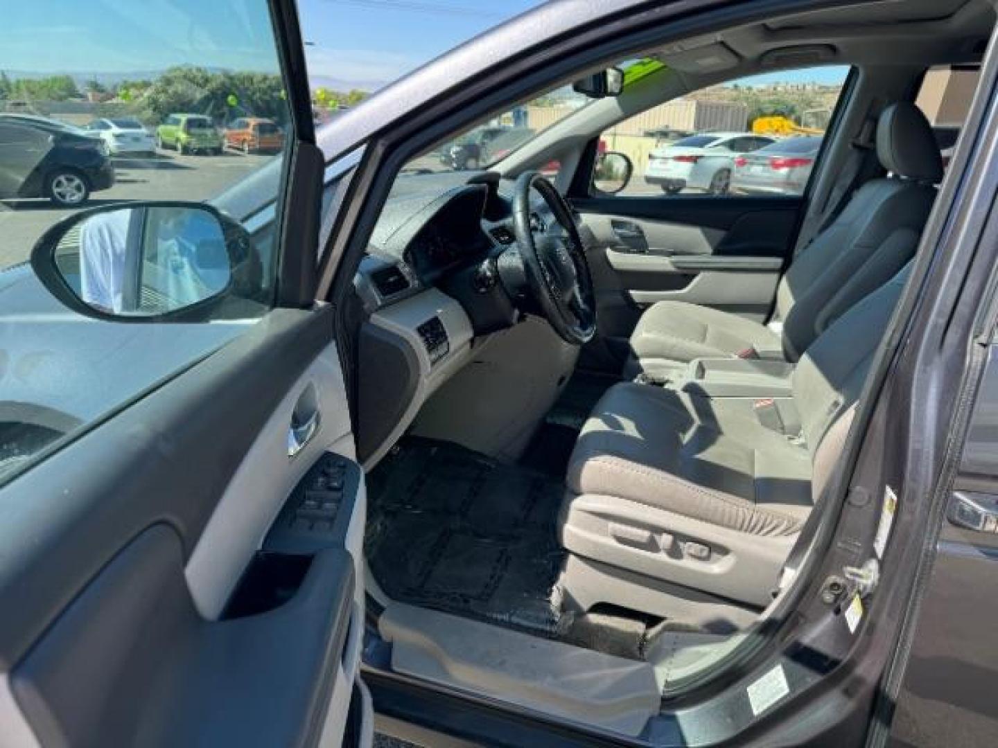 2016 Modern Steel Metallic /Gray, leather Honda Odyssey EX-L (5FNRL5H6XGB) with an 3.5L V6 SOHC 24V engine, 6-Speed Automatic transmission, located at 1865 East Red Hills Pkwy, St. George, 84770, (435) 628-0023, 37.120850, -113.543640 - Photo#12