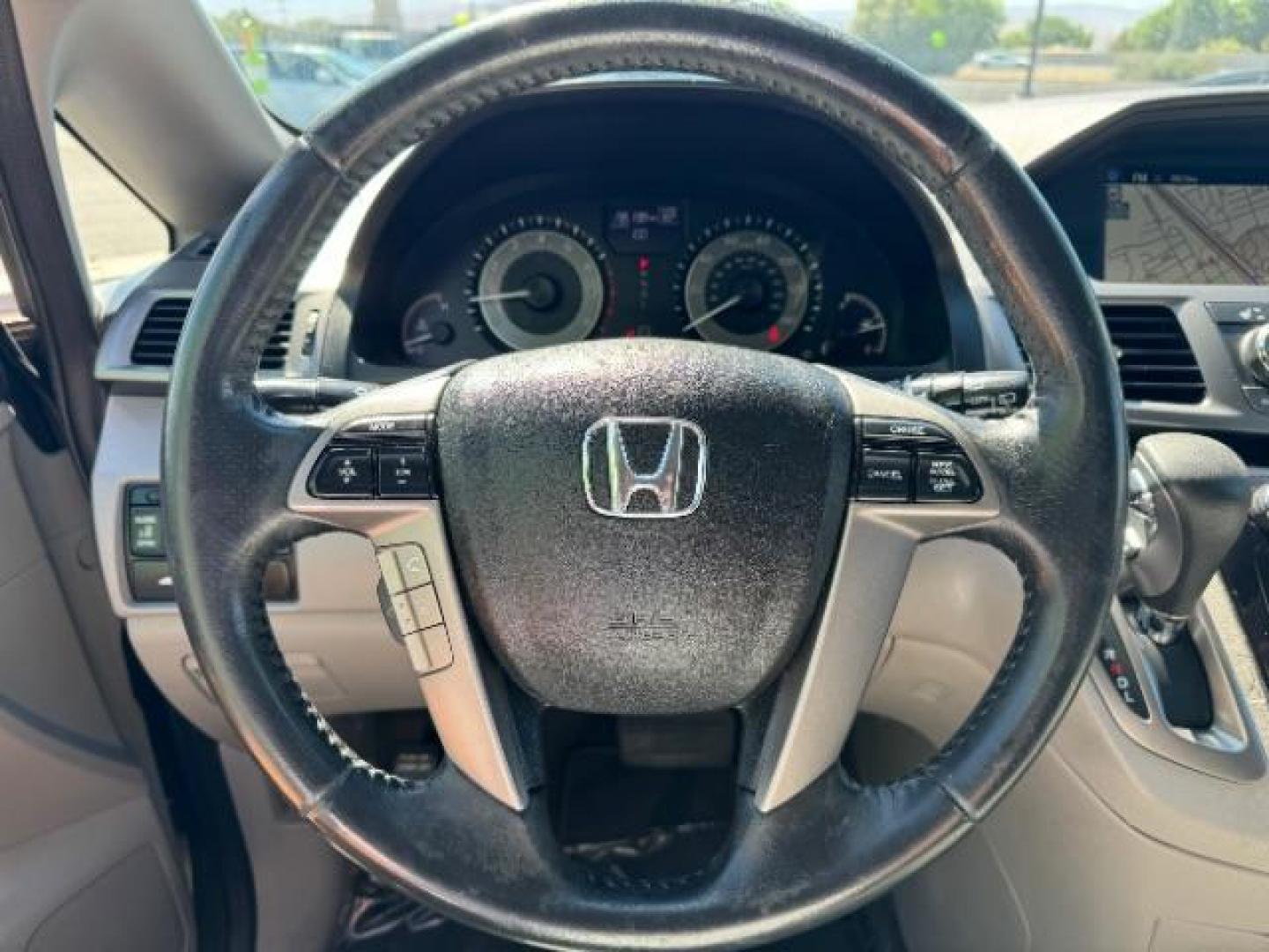 2016 Modern Steel Metallic /Gray, leather Honda Odyssey EX-L (5FNRL5H6XGB) with an 3.5L V6 SOHC 24V engine, 6-Speed Automatic transmission, located at 1865 East Red Hills Pkwy, St. George, 84770, (435) 628-0023, 37.120850, -113.543640 - Photo#17