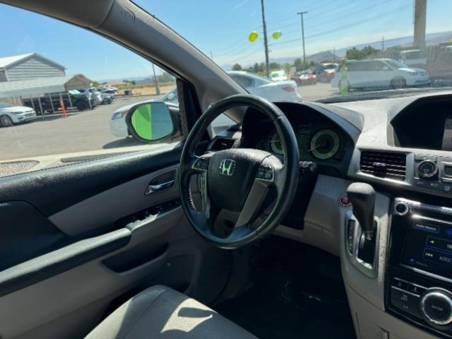 2016 Modern Steel Metallic /Gray, leather Honda Odyssey EX-L (5FNRL5H6XGB) with an 3.5L V6 SOHC 24V engine, 6-Speed Automatic transmission, located at 1865 East Red Hills Pkwy, St. George, 84770, (435) 628-0023, 37.120850, -113.543640 - Photo#40