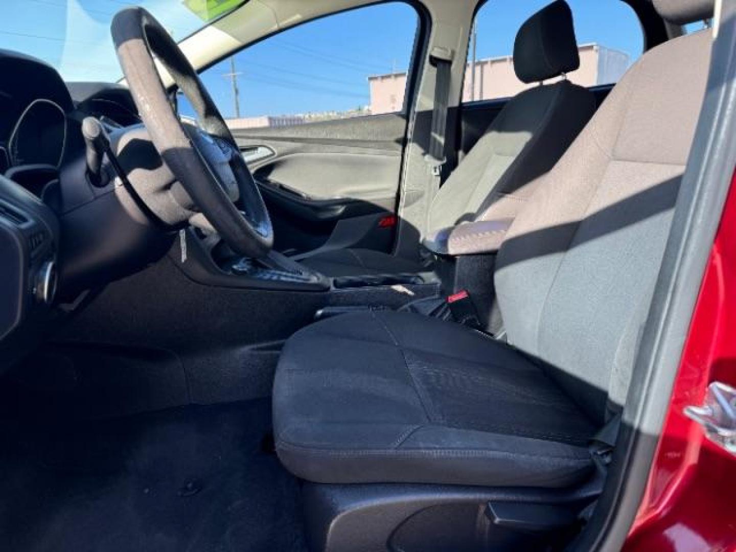 2015 Race Red /Charcoal Black Insert w/Warm Steel Surround, cloth Ford Focus SE Hatch (1FADP3K21FL) with an 2.0L L4 DOHC 16V engine, 5-Speed Manual transmission, located at 940 North Main Street, Cedar City, UT, 84720, (435) 628-0023, 37.692936, -113.061897 - We specialize in helping ALL people get the best financing available. No matter your credit score, good, bad or none we can get you an amazing rate. Had a bankruptcy, divorce, or repossessions? We give you the green light to get your credit back on the road. Low down and affordable payments that fit - Photo#17