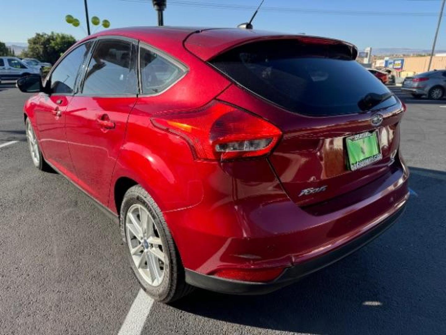 2015 Race Red /Charcoal Black Insert w/Warm Steel Surround, cloth Ford Focus SE Hatch (1FADP3K21FL) with an 2.0L L4 DOHC 16V engine, 5-Speed Manual transmission, located at 940 North Main Street, Cedar City, UT, 84720, (435) 628-0023, 37.692936, -113.061897 - We specialize in helping ALL people get the best financing available. No matter your credit score, good, bad or none we can get you an amazing rate. Had a bankruptcy, divorce, or repossessions? We give you the green light to get your credit back on the road. Low down and affordable payments that fit - Photo#4