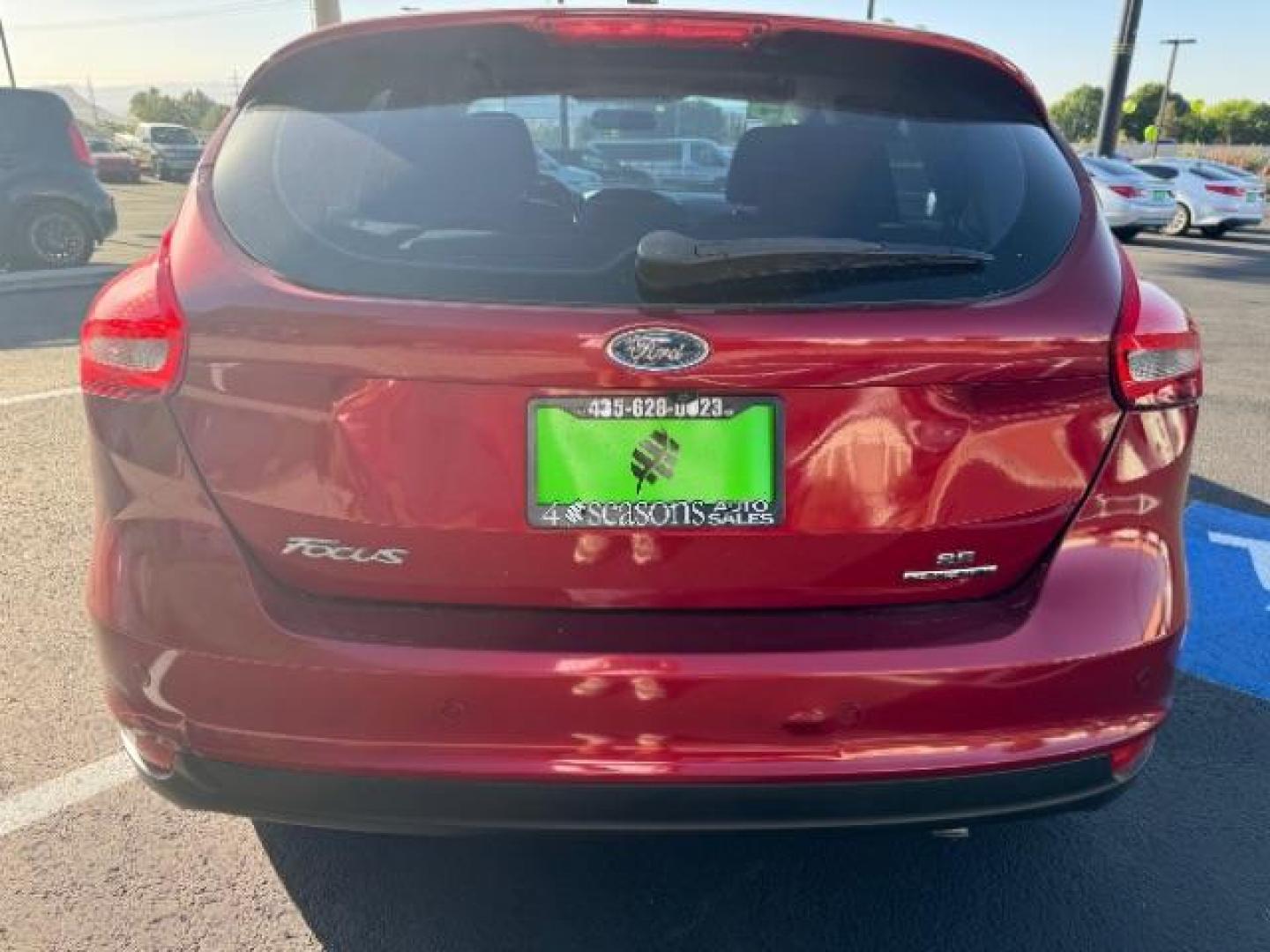 2015 Race Red /Charcoal Black Insert w/Warm Steel Surround, cloth Ford Focus SE Hatch (1FADP3K21FL) with an 2.0L L4 DOHC 16V engine, 5-Speed Manual transmission, located at 940 North Main Street, Cedar City, UT, 84720, (435) 628-0023, 37.692936, -113.061897 - We specialize in helping ALL people get the best financing available. No matter your credit score, good, bad or none we can get you an amazing rate. Had a bankruptcy, divorce, or repossessions? We give you the green light to get your credit back on the road. Low down and affordable payments that fit - Photo#5