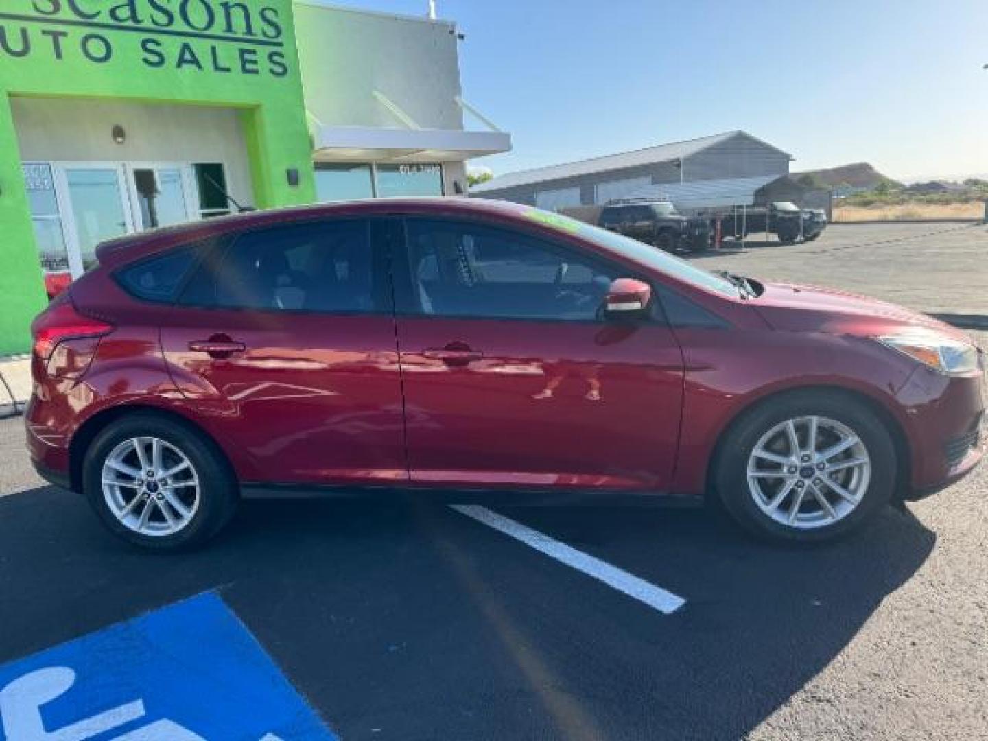 2015 Race Red /Charcoal Black Insert w/Warm Steel Surround, cloth Ford Focus SE Hatch (1FADP3K21FL) with an 2.0L L4 DOHC 16V engine, 5-Speed Manual transmission, located at 940 North Main Street, Cedar City, UT, 84720, (435) 628-0023, 37.692936, -113.061897 - Photo#7