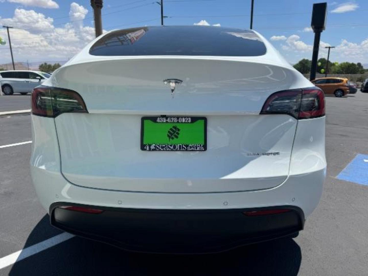 2022 Pearl White Multi-Coat /All Black Tesla Model Y Long Range (7SAYGDEE0NF) with an ELECTRIC engine, 1-Speed Automatic transmission, located at 1865 East Red Hills Pkwy, St. George, 84770, (435) 628-0023, 37.120850, -113.543640 - SOLD - But we can find you any Tesla, Call us! ***Purchase price AFTER $4k rebate has been transferred to dealership*** This allows us to reduce the asking price from $28,995 (without tax rebate) to be under the $25k threshold. Visit Energy.gov for full rules. Beautiful LONG RANGE ALL WHEEL DRI - Photo#6