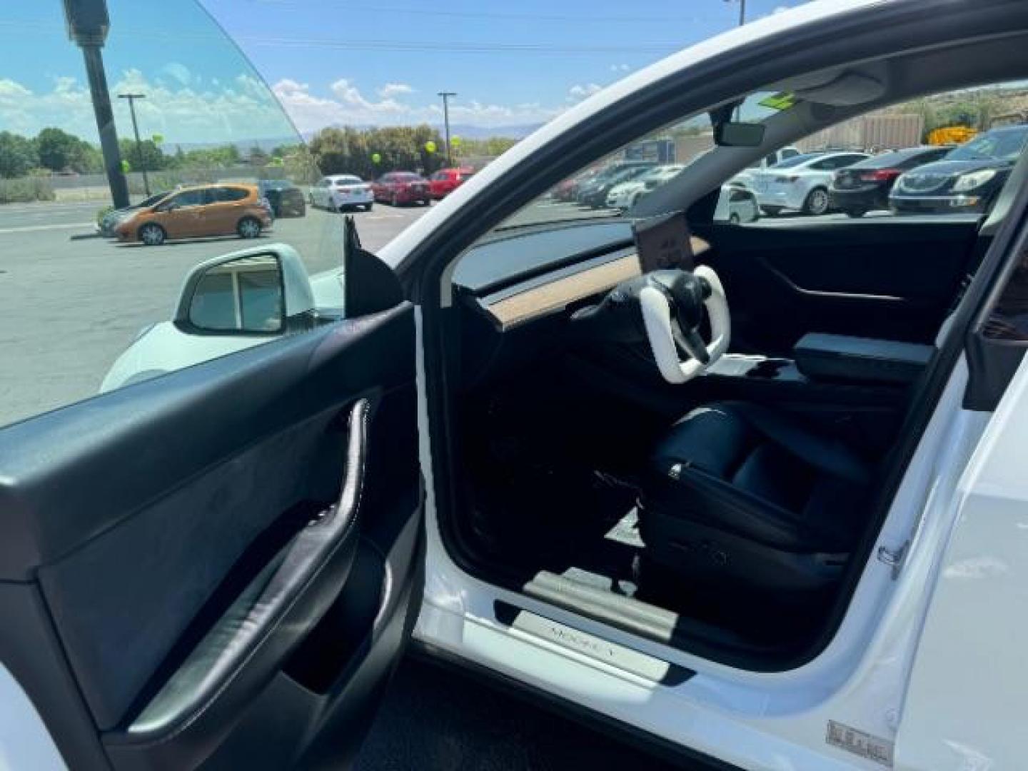 2022 Pearl White Multi-Coat /All Black Tesla Model Y Long Range (7SAYGDEE0NF) with an ELECTRIC engine, 1-Speed Automatic transmission, located at 1865 East Red Hills Pkwy, St. George, 84770, (435) 628-0023, 37.120850, -113.543640 - SOLD - But we can find you any Tesla, Call us! ***Purchase price AFTER $4k rebate has been transferred to dealership*** This allows us to reduce the asking price from $28,995 (without tax rebate) to be under the $25k threshold. Visit Energy.gov for full rules. Beautiful LONG RANGE ALL WHEEL DRI - Photo#13