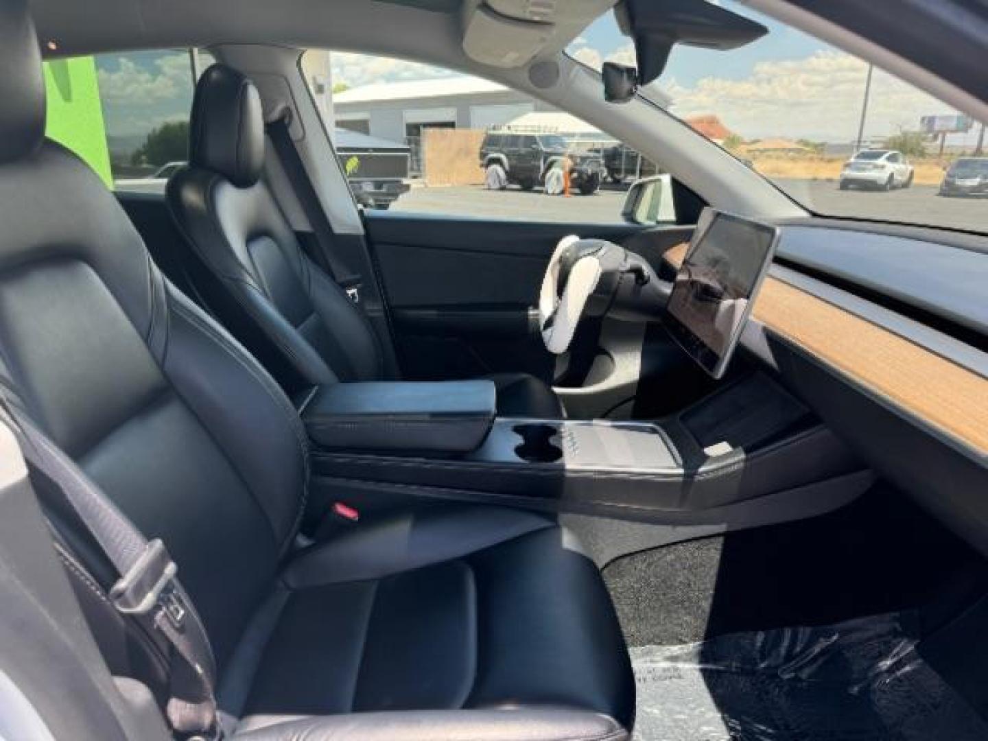 2022 Pearl White Multi-Coat /All Black Tesla Model Y Long Range (7SAYGDEE0NF) with an ELECTRIC engine, 1-Speed Automatic transmission, located at 1865 East Red Hills Pkwy, St. George, 84770, (435) 628-0023, 37.120850, -113.543640 - SOLD - But we can find you any Tesla, Call us! ***Purchase price AFTER $4k rebate has been transferred to dealership*** This allows us to reduce the asking price from $28,995 (without tax rebate) to be under the $25k threshold. Visit Energy.gov for full rules. Beautiful LONG RANGE ALL WHEEL DRI - Photo#29