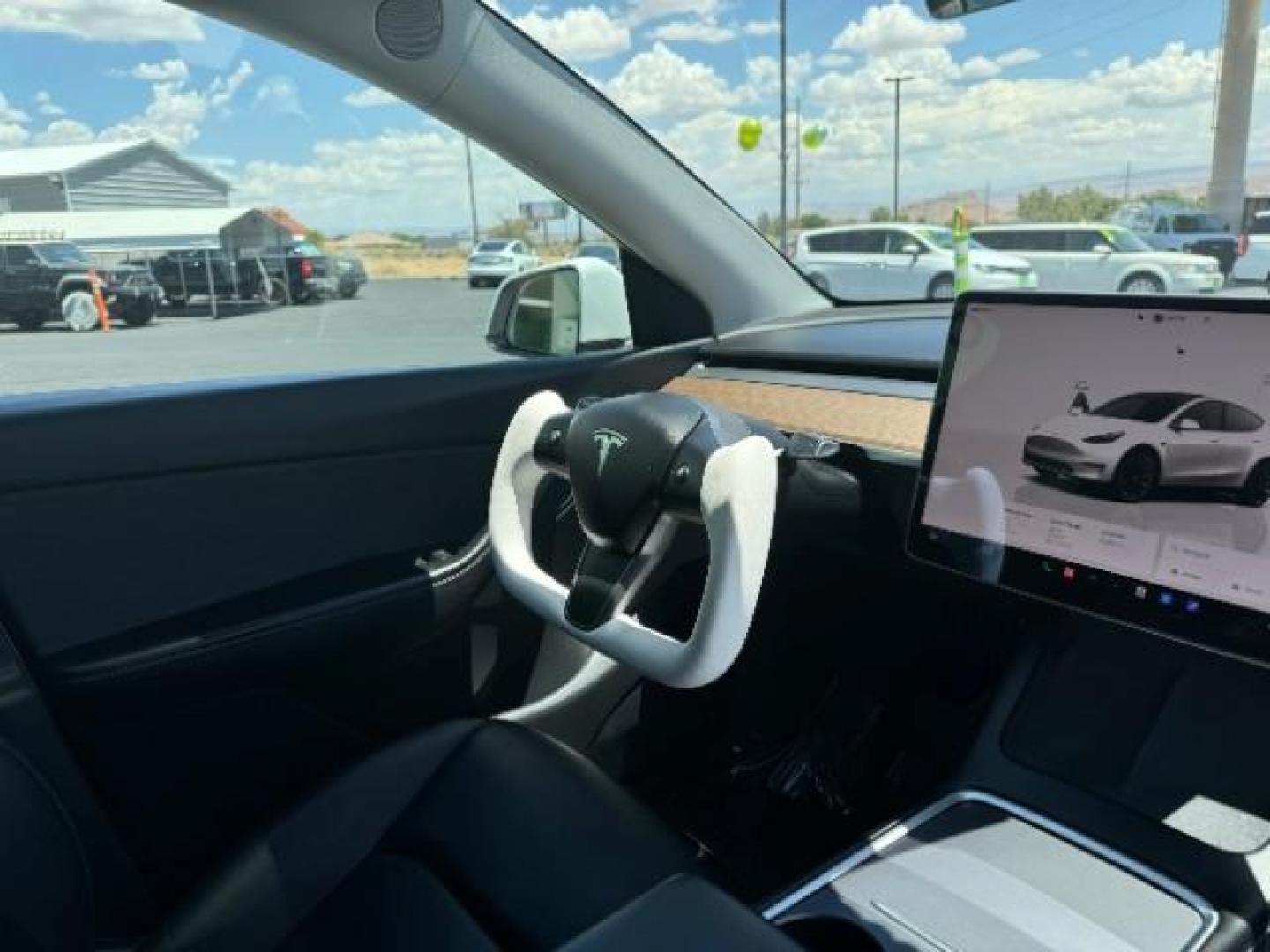 2022 Pearl White Multi-Coat /All Black Tesla Model Y Long Range (7SAYGDEE0NF) with an ELECTRIC engine, 1-Speed Automatic transmission, located at 1865 East Red Hills Pkwy, St. George, 84770, (435) 628-0023, 37.120850, -113.543640 - SOLD - But we can find you any Tesla, Call us! ***Purchase price AFTER $4k rebate has been transferred to dealership*** This allows us to reduce the asking price from $28,995 (without tax rebate) to be under the $25k threshold. Visit Energy.gov for full rules. Beautiful LONG RANGE ALL WHEEL DRI - Photo#31