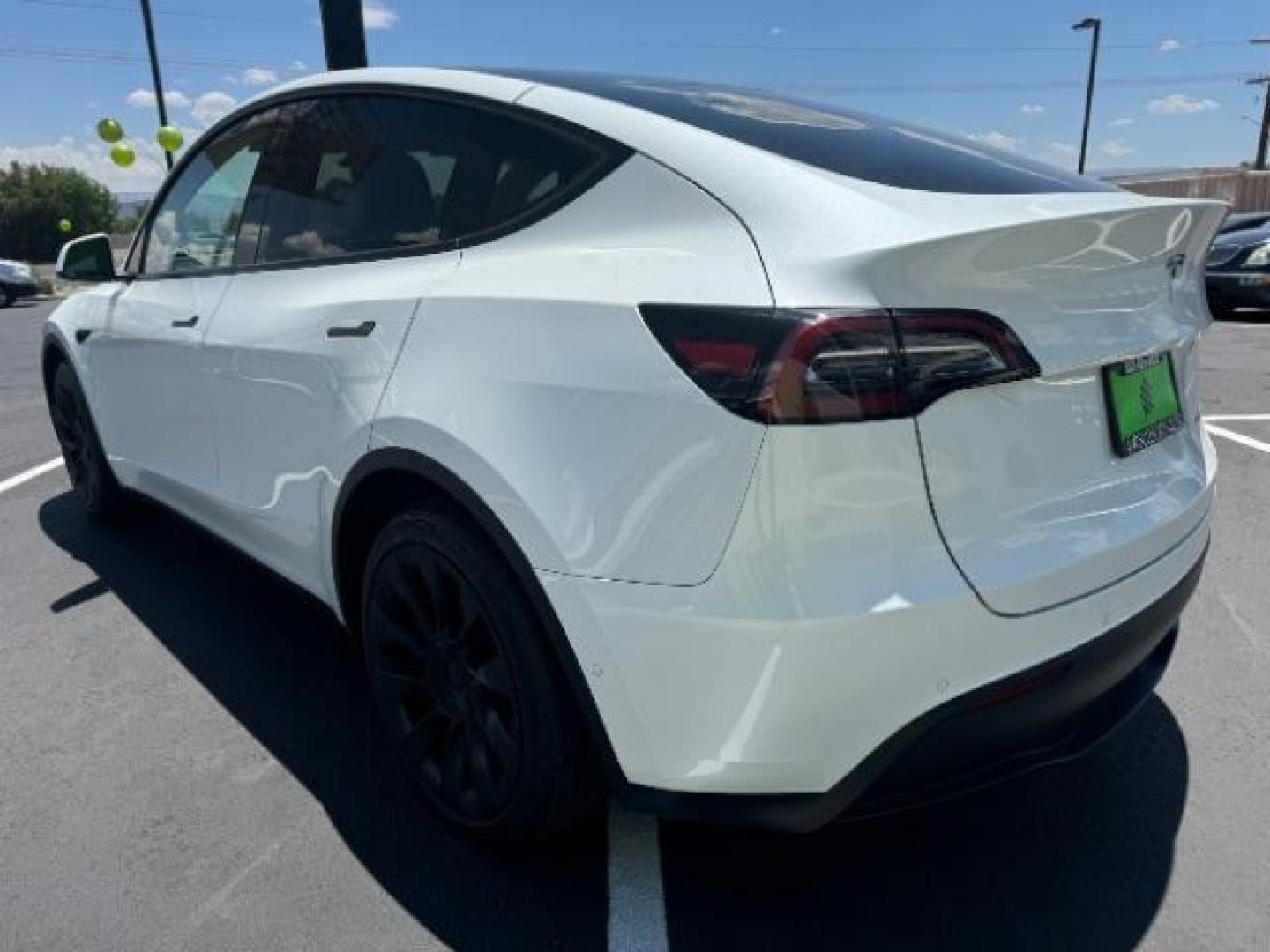 2022 Pearl White Multi-Coat /All Black Tesla Model Y Long Range (7SAYGDEE0NF) with an ELECTRIC engine, 1-Speed Automatic transmission, located at 1865 East Red Hills Pkwy, St. George, 84770, (435) 628-0023, 37.120850, -113.543640 - Photo#5