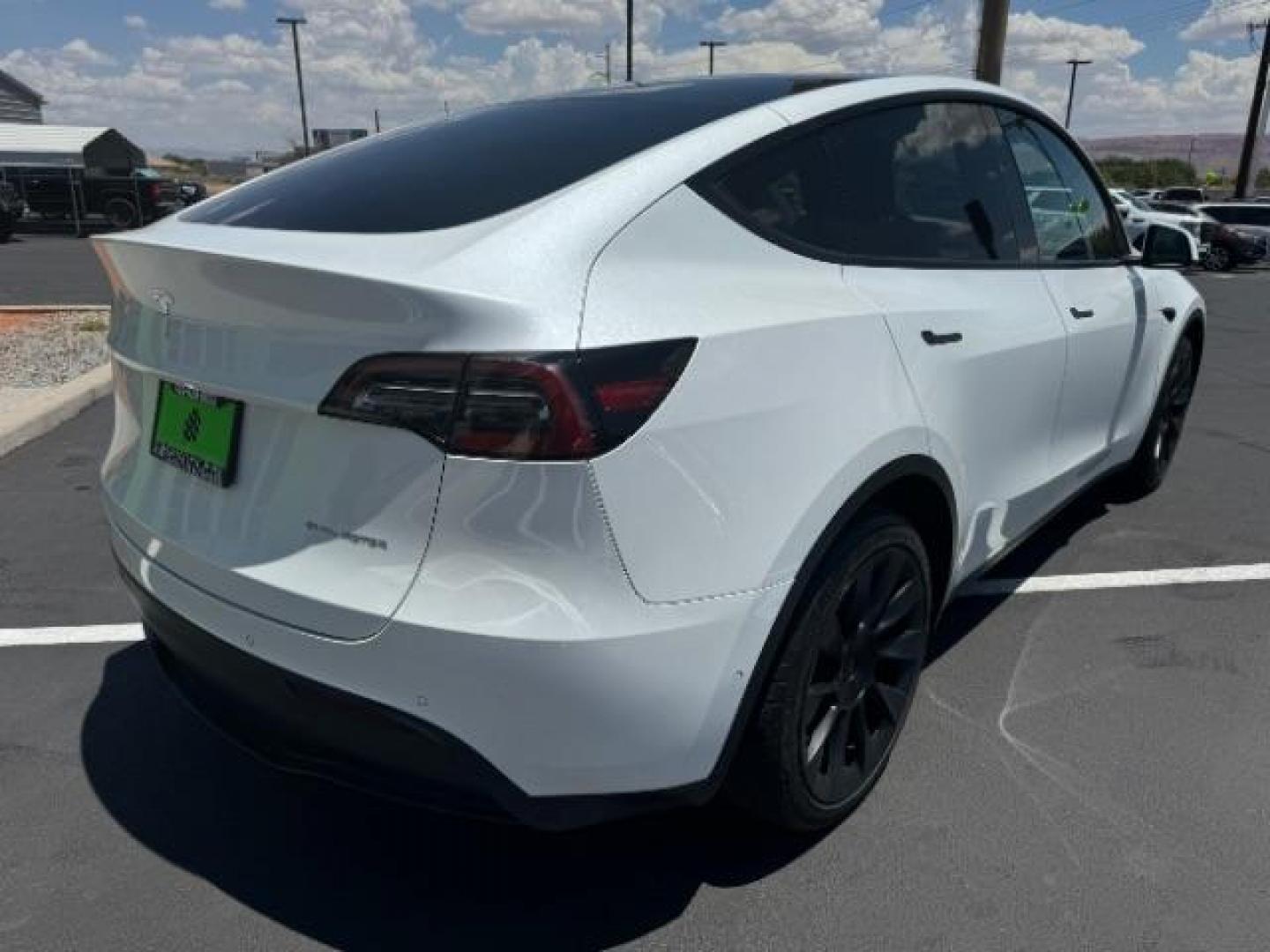 2022 Pearl White Multi-Coat /All Black Tesla Model Y Long Range (7SAYGDEE0NF) with an ELECTRIC engine, 1-Speed Automatic transmission, located at 1865 East Red Hills Pkwy, St. George, 84770, (435) 628-0023, 37.120850, -113.543640 - SOLD - But we can find you any Tesla, Call us! ***Purchase price AFTER $4k rebate has been transferred to dealership*** This allows us to reduce the asking price from $28,995 (without tax rebate) to be under the $25k threshold. Visit Energy.gov for full rules. Beautiful LONG RANGE ALL WHEEL DRI - Photo#7